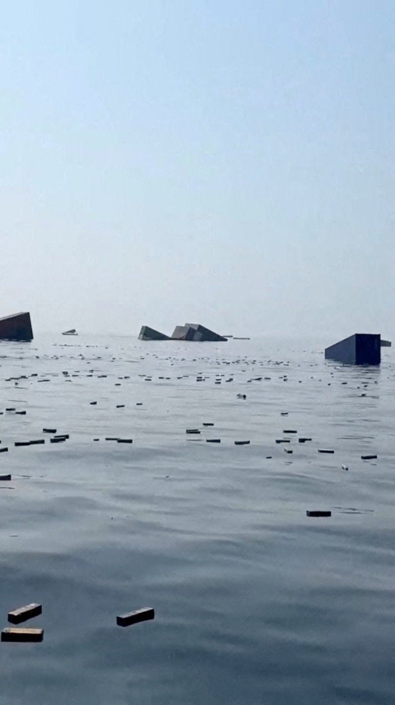 Pictures reveal huge cargo containers floating in Strait of Hormuz ...