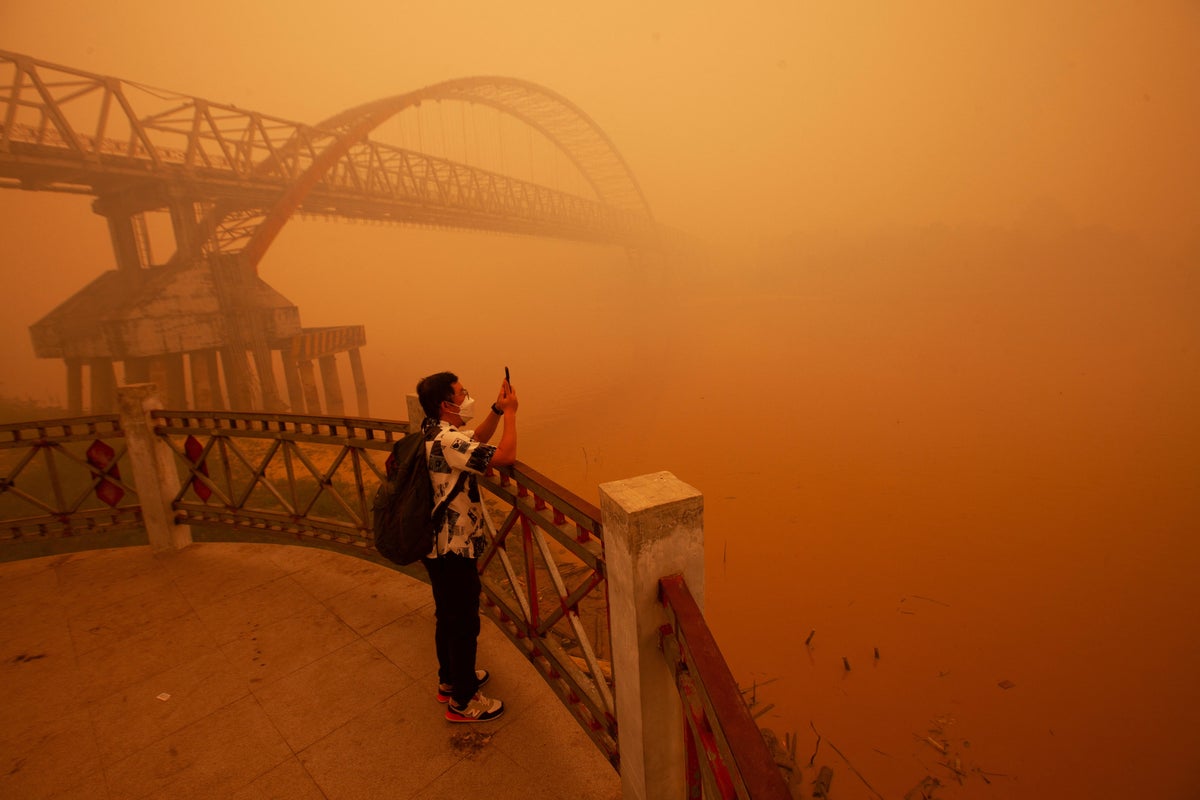 Indonesia tests dropping dry ice to reduce haze from forest fires in South Sumatra