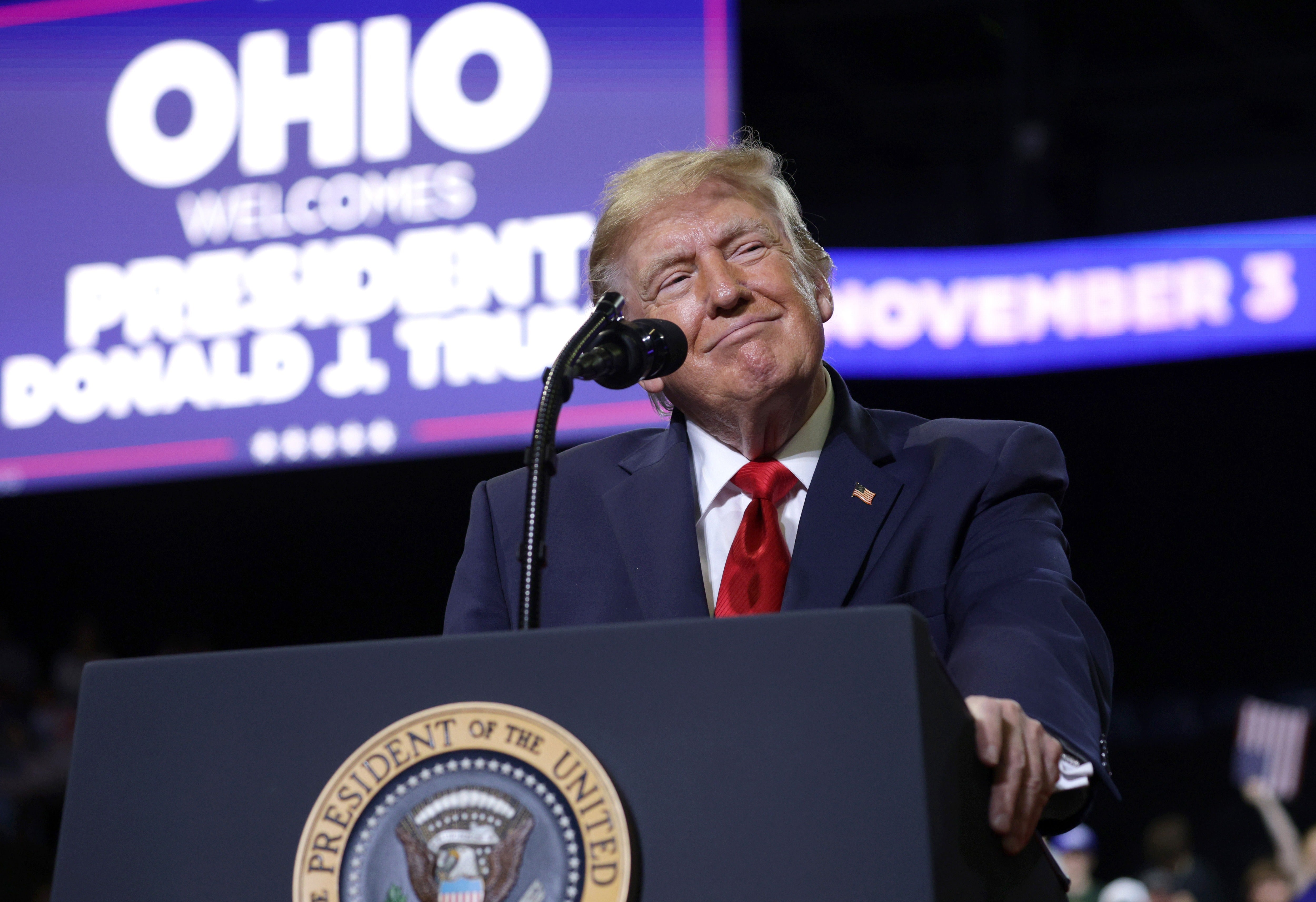 'I'm standing over here, and I don't do this with men very often. I started examining his body because I didn't know he was a great athlete, and I looked, and I watched up and down,' Trump said of Husted, a former college football player, at a rally Monday night in Youngstown, Ohio