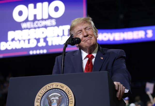 'I'm standing over here, and I don't do this with men very often. I started examining his body because I didn't know he was a great athlete, and I looked, and I watched up and down,' Trump said of Husted, a former college football player, at a rally Monday night in Youngstown, Ohio