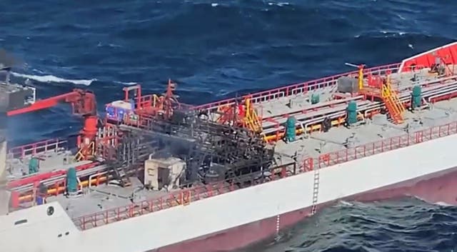 A screengrab from an aerial footage shows San Marino-flagged tanker wine trader ship that caught fire in Romanian territorial waters, released October 15, 2026 ( Romanian Interior