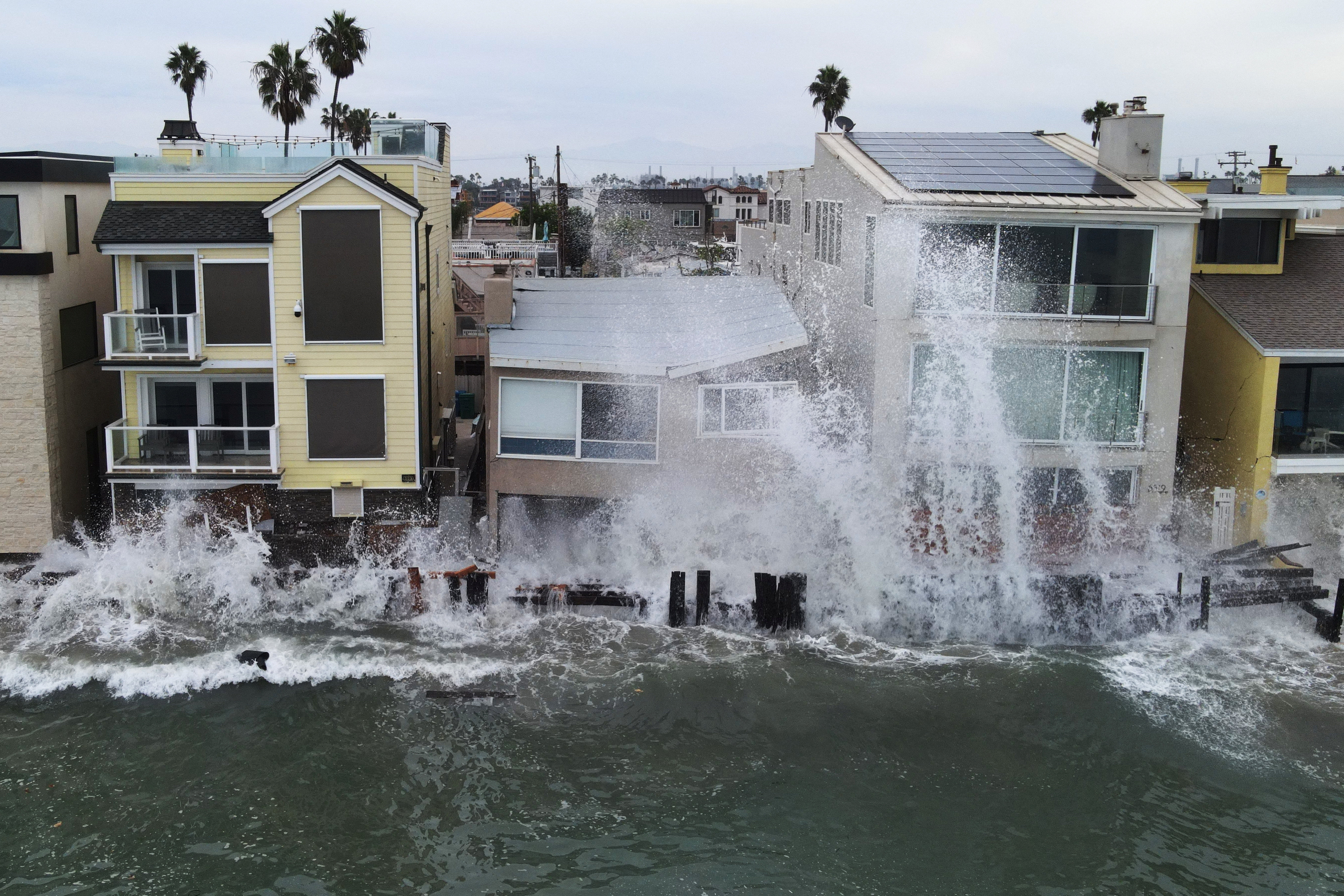 Tropical Storm Rachel and El Nino fueled Kelvin waves pound the boardwalk in Long Beach