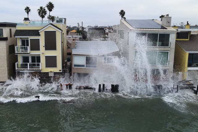 Tropical Storm Rachel and El Nino fueled Kelvin waves pound the boardwalk in Long Beach