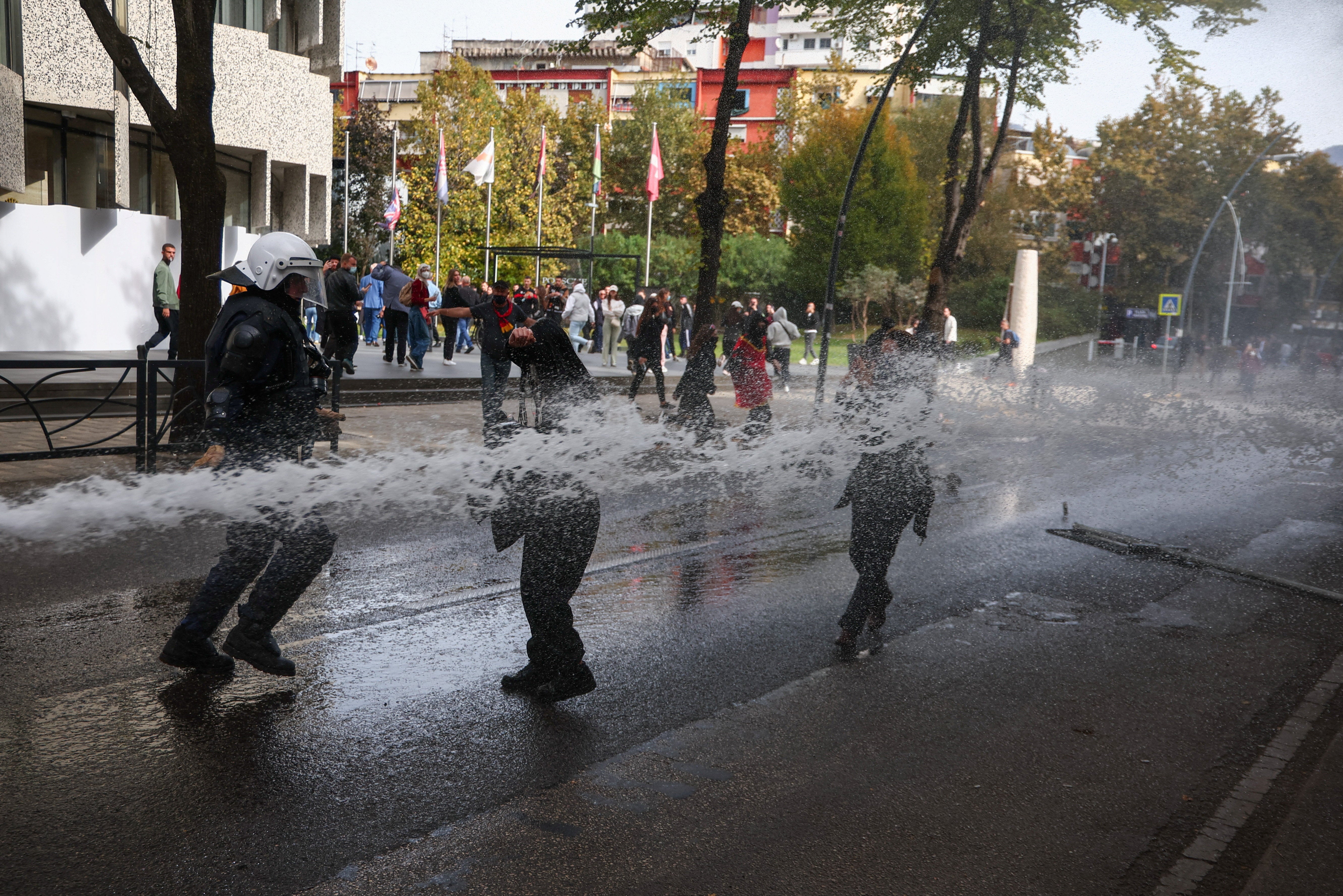 Police blast demonstrators with water amid an anti-government protest by students in Tirana, Albania. ( Reuters )