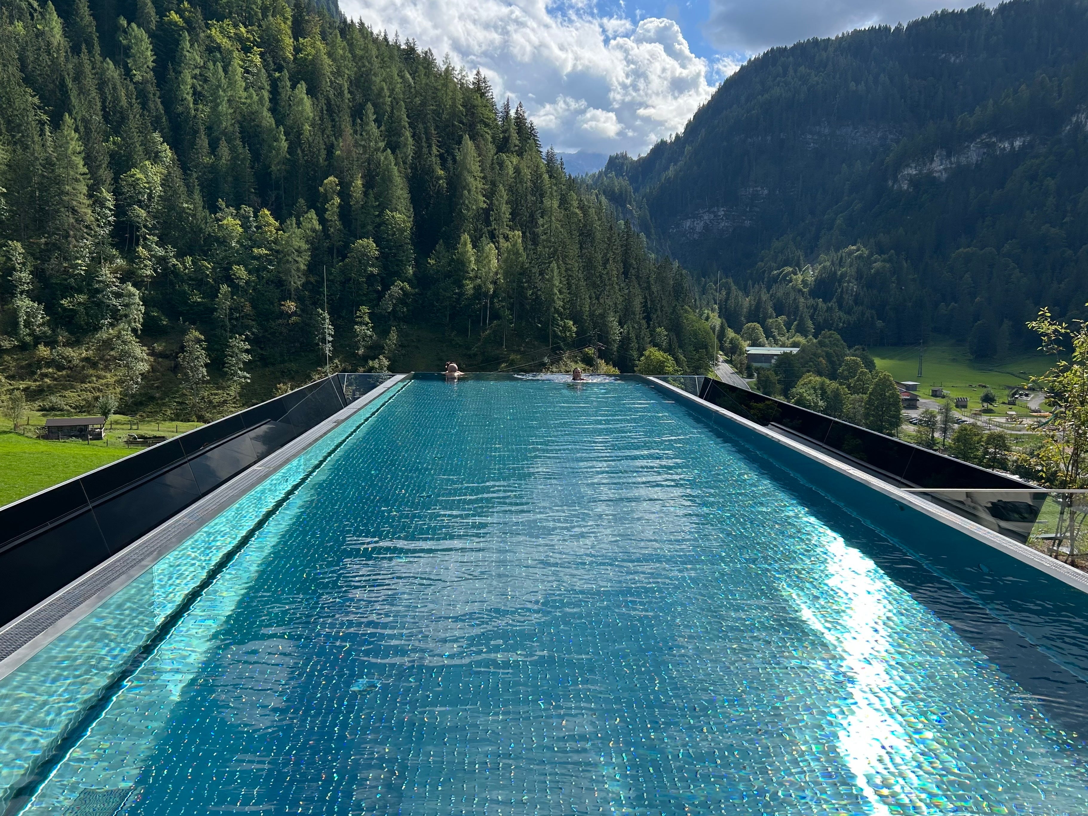 The jewel in the crown is the 20-metre infinity pool perched on the roof of the building, offering unparalleled views of the mountains