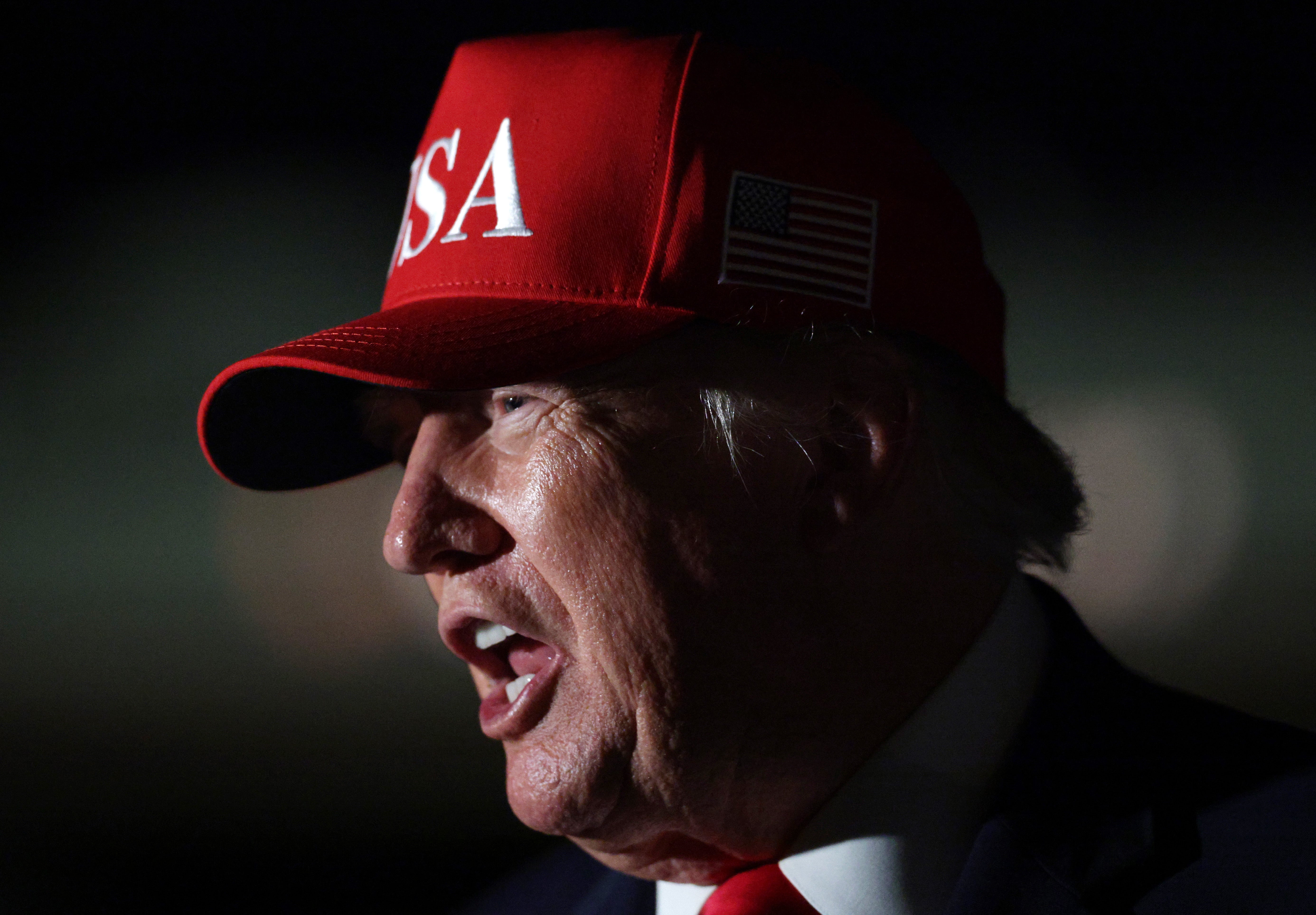 Donald Trump speaks to the media on the tarmac before boarding Air Force One at Missoula Montana Airport