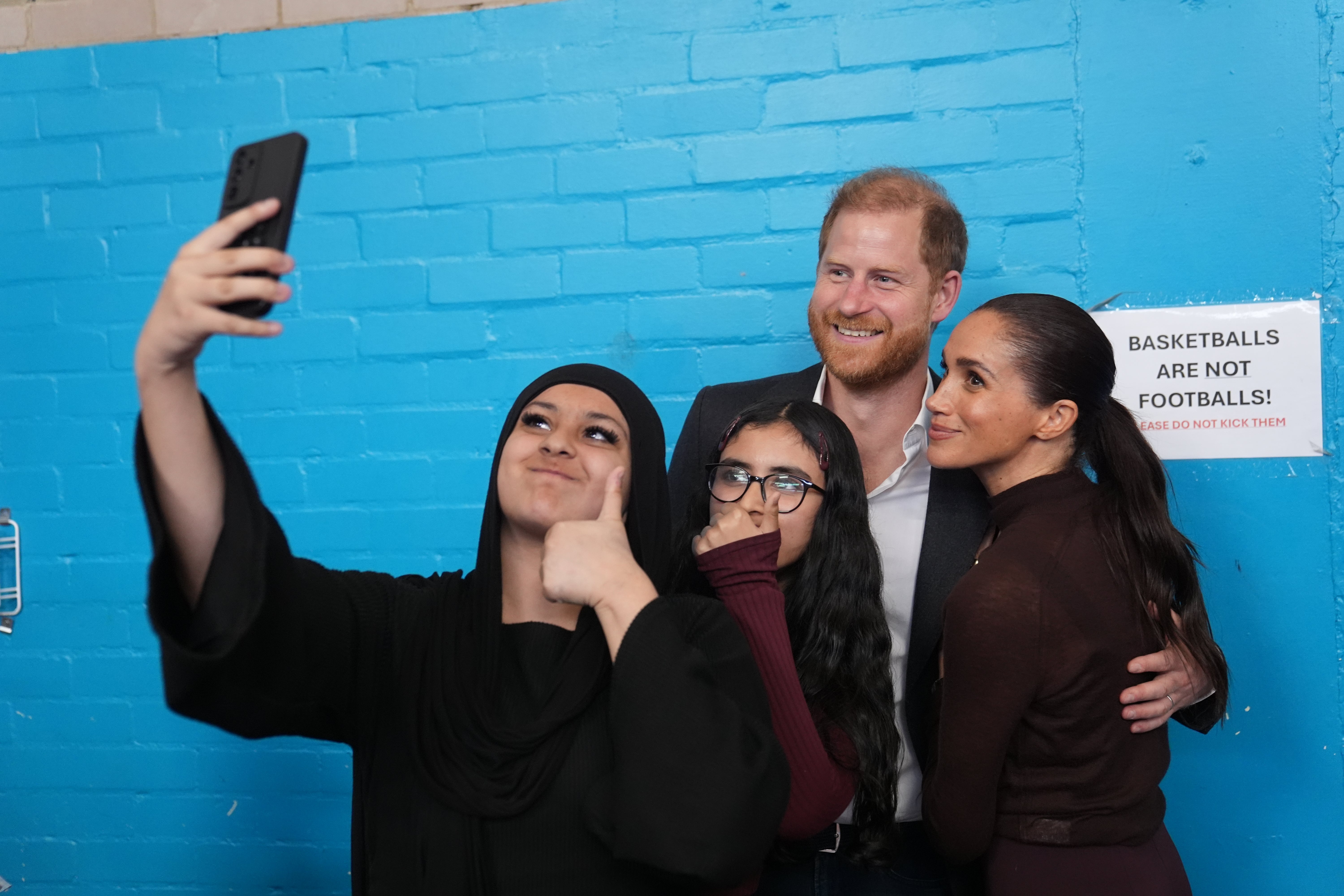 The couple pose for a selfie during a visit to a charity in Nottingham