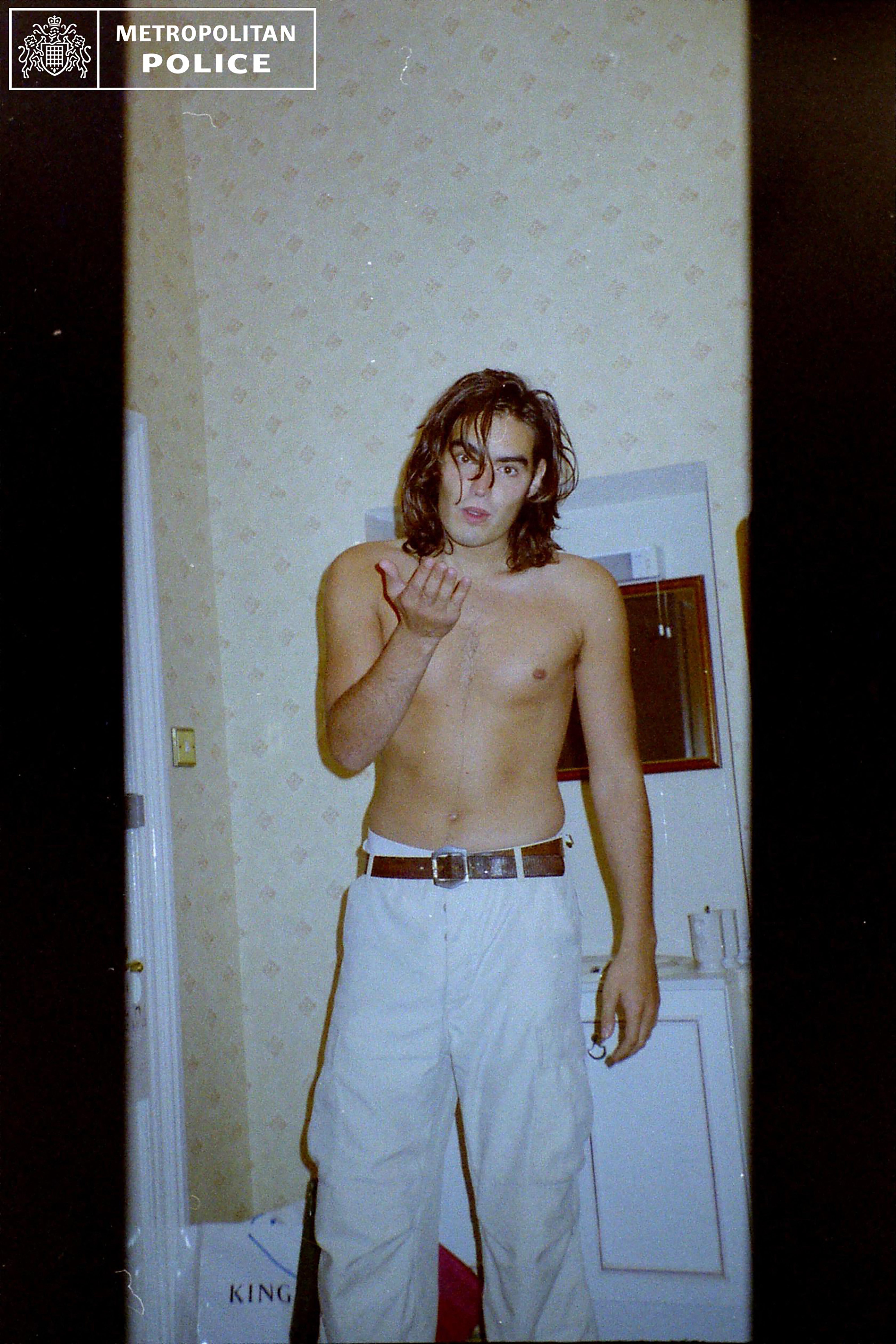 The jury was shown photographs of a topless Russell Brand taken by a woman who alleges that he raped her