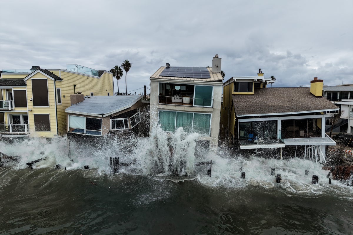 Using a drone, AP's Jae C. Hong frames Long Beach's waves crashing into oceanfront homes