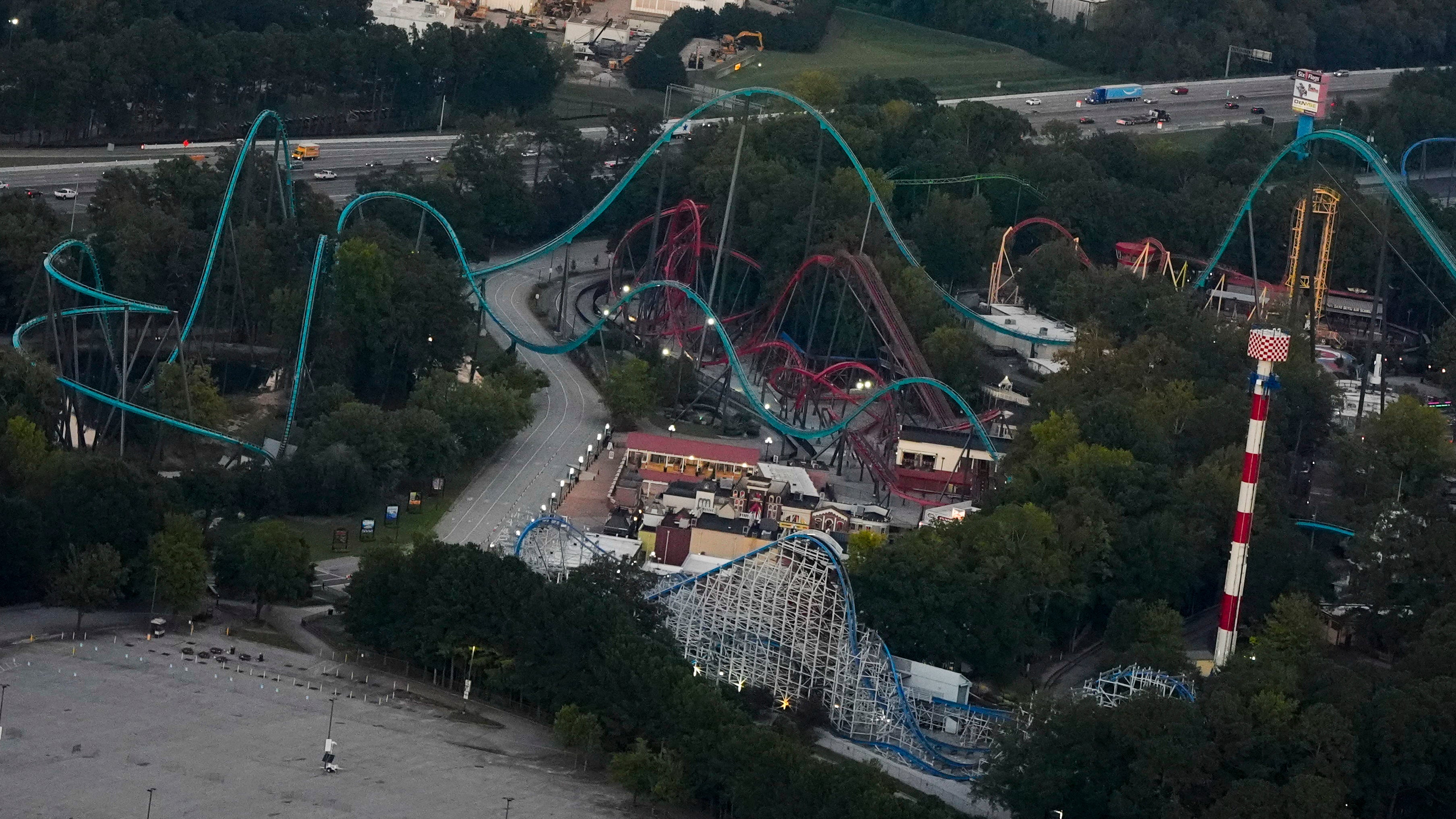Police and a state regulatory agency are investigating what caused Hassan Jihad Ibn Kariem, a 42-year-old school employee from Atlanta, to fall from the Goliath coaster on Monday