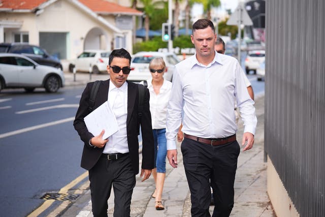 Joshua Foster, right, with his lawyer Alexandros Alexandrou ( PA )