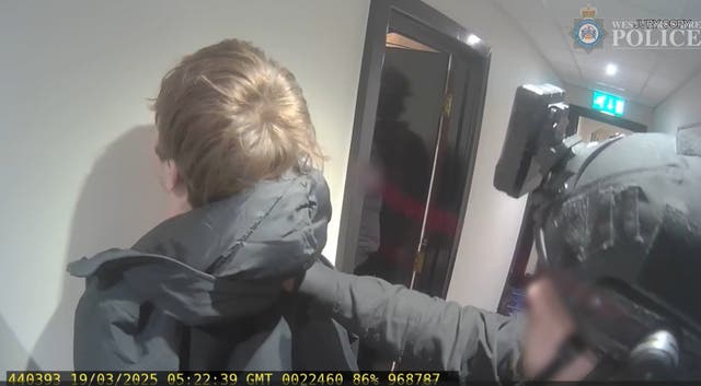 Police officers arrest Johannes Kongsnes Natland