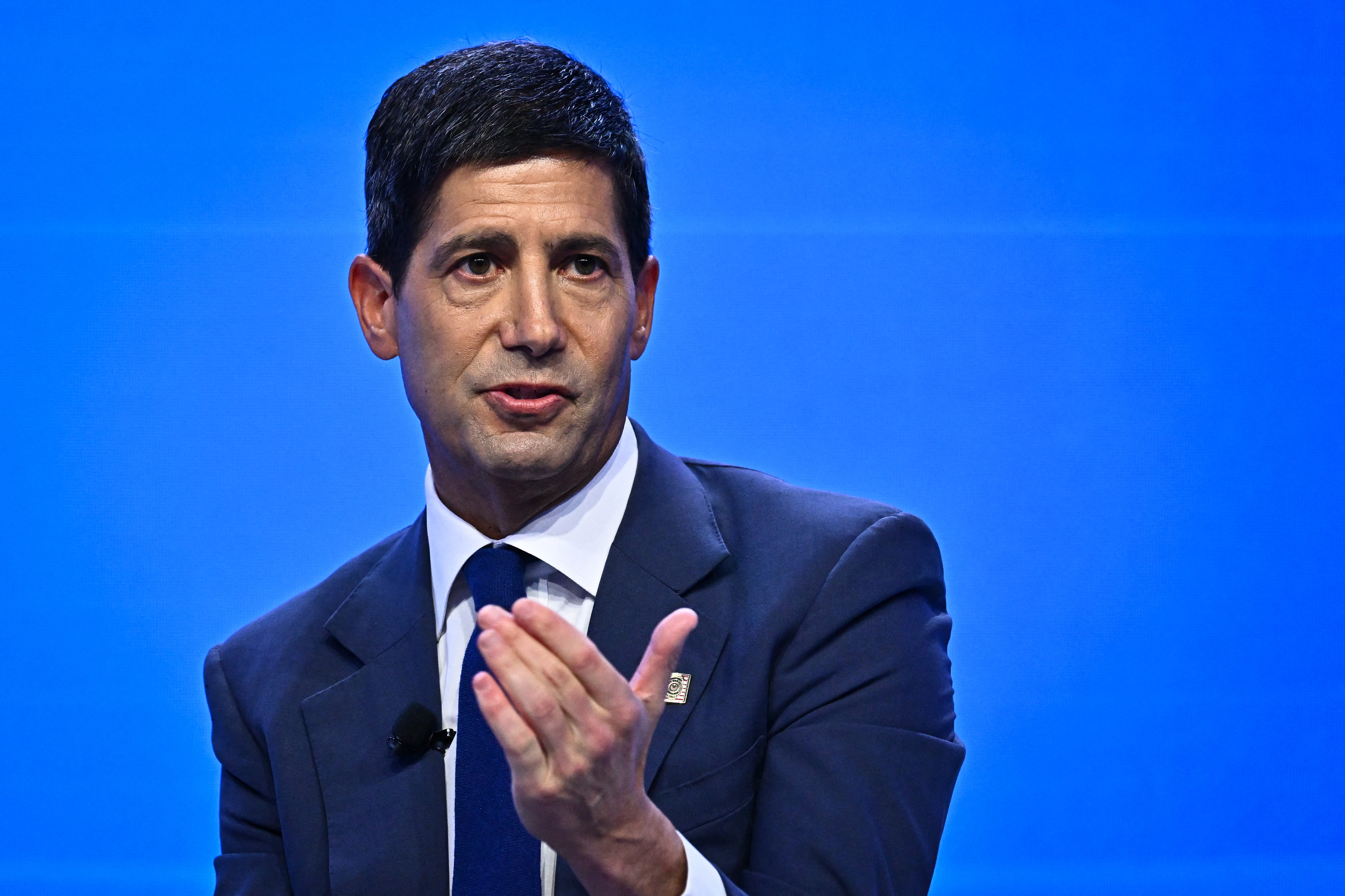 Chairman of the US Federal Reserve Kevin Warsh (R) speaks during a "fireside chat" with IMF Managing Director Kristalina Georgieva at the Annual Meetings of the International Monetary Fund