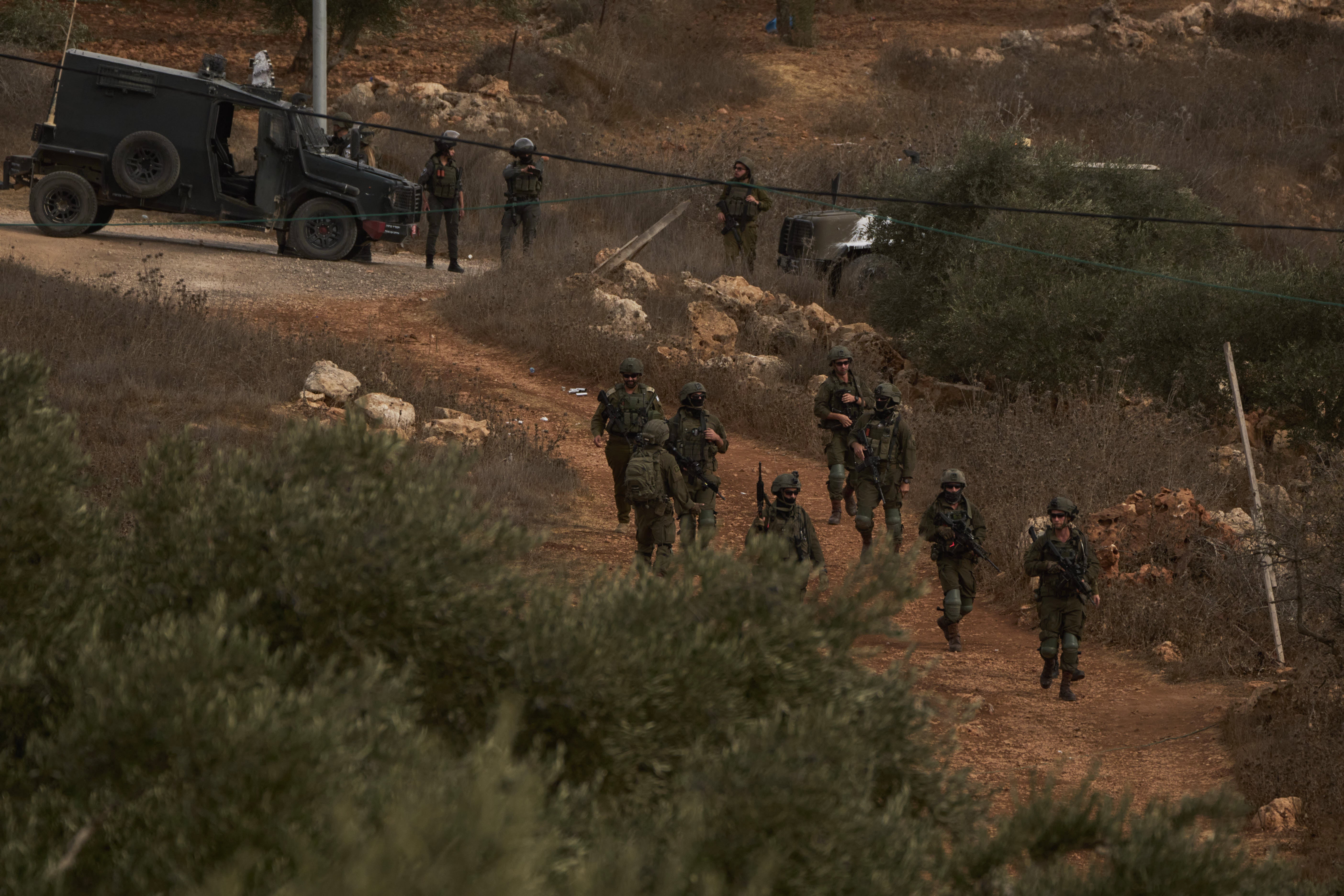 Photos show Israeli settler attacks disrupting the West Bank olive harvest