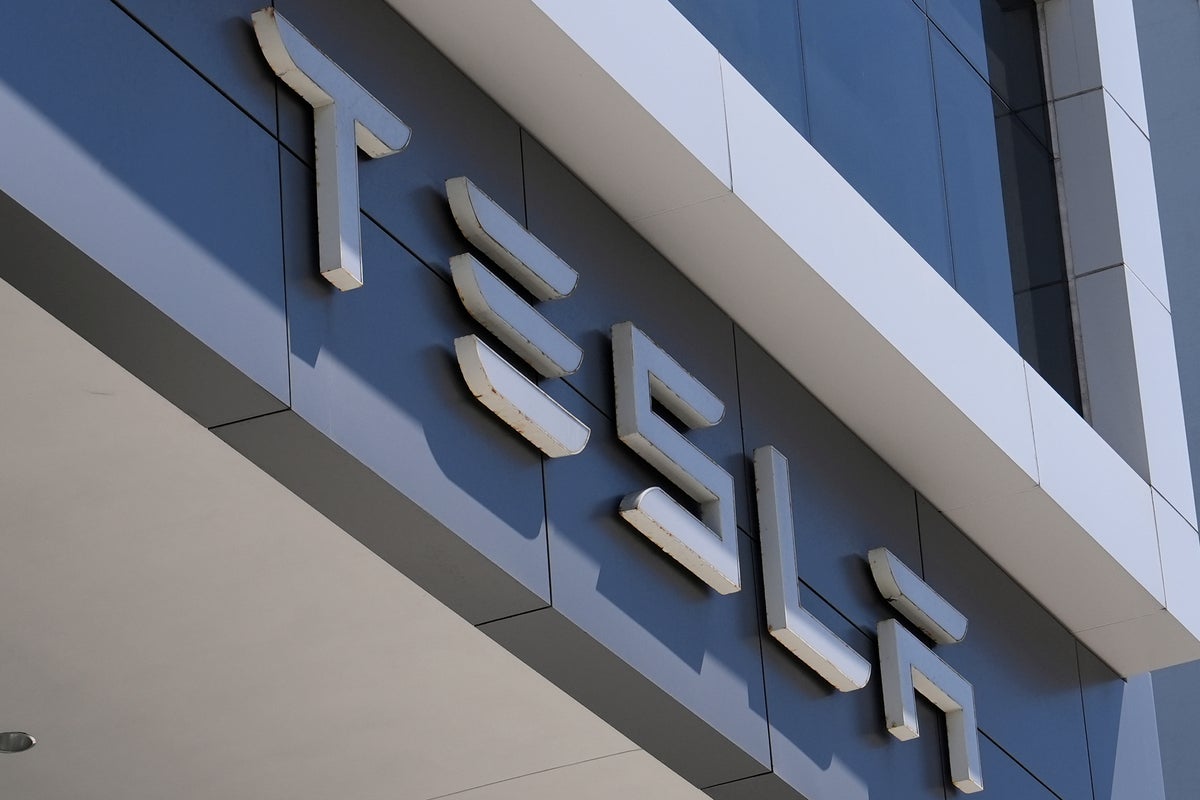 Tesla's Q3 profit drops as it prepares for possible merger with Musk's other public company, SpaceX