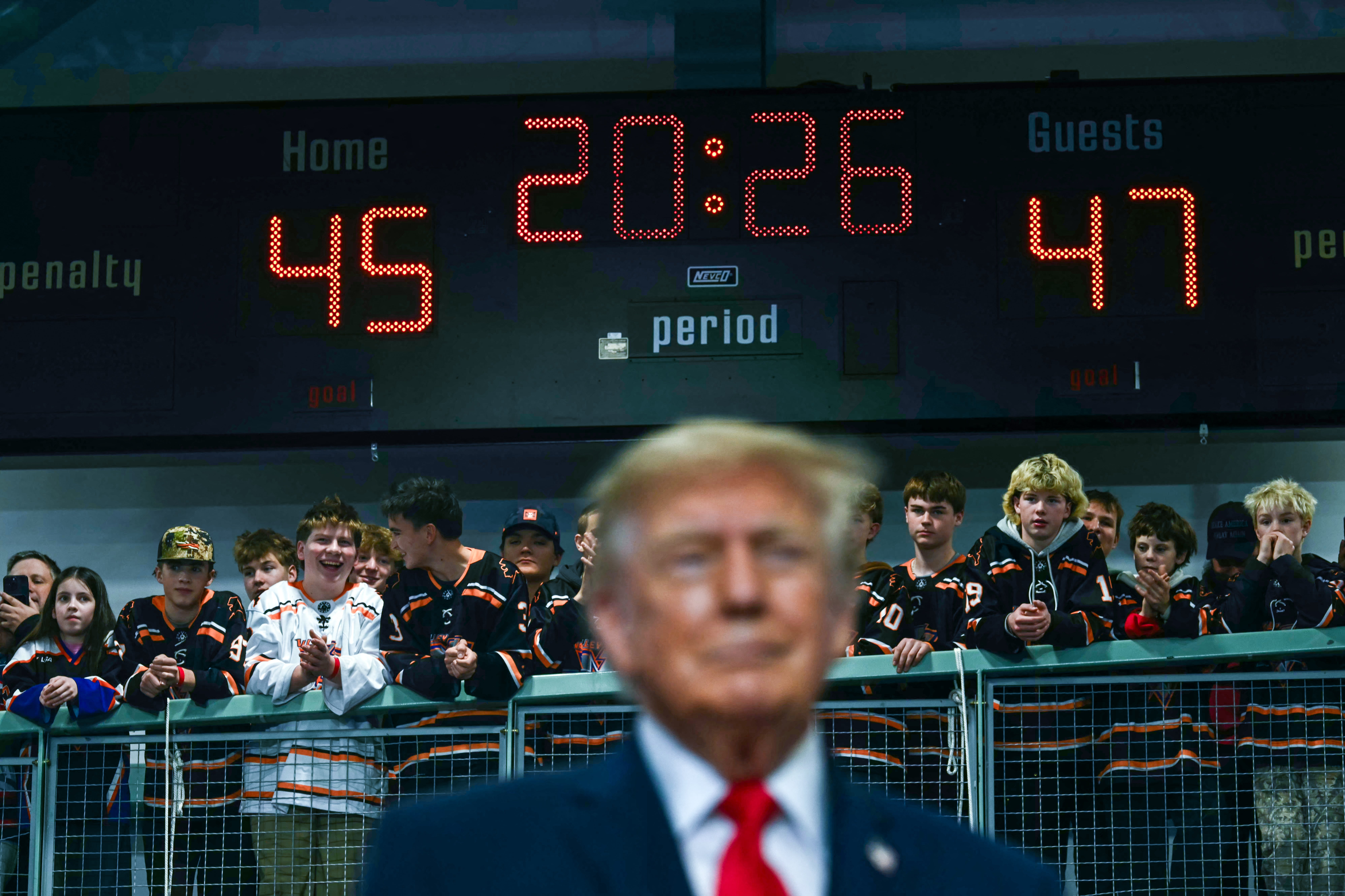 Children watch President Donald Trump at a rally in Wasilla, Alaska, on October 13, 2026. Trump is trying to pass the Sunshine Protection Act, a bill passed by the House in the summer but flailing in the Senate, with some lawmakers in the upper chamber refusing to get on board. Many are opposed because of the impact on schools, arguing that daylight saving time is more dangerous for children