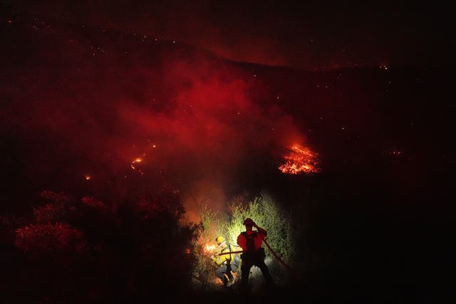 Crews make a stand in front of the Bryson Fire
