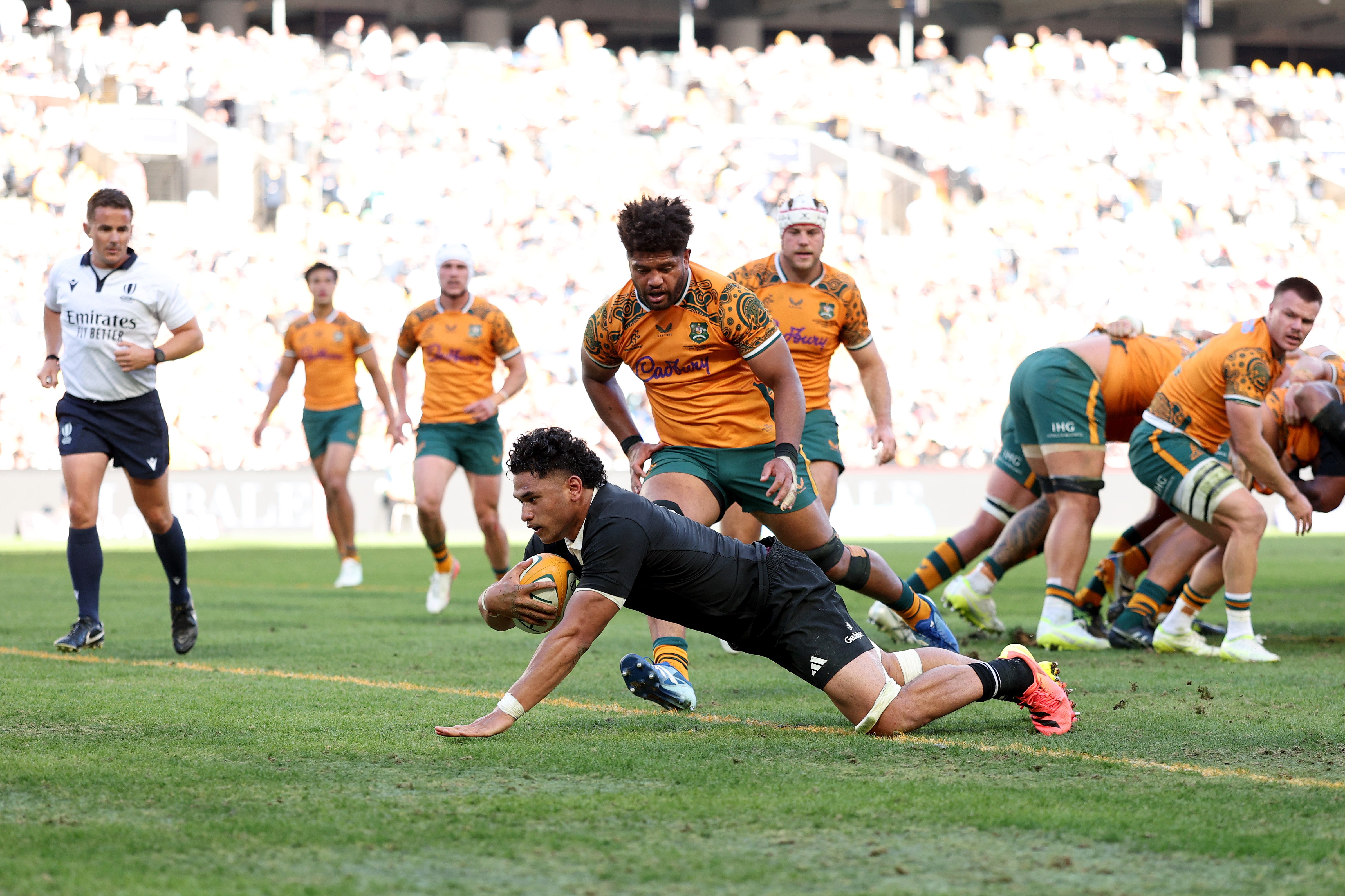 Wallace Sititi of the All Blacks scores a try