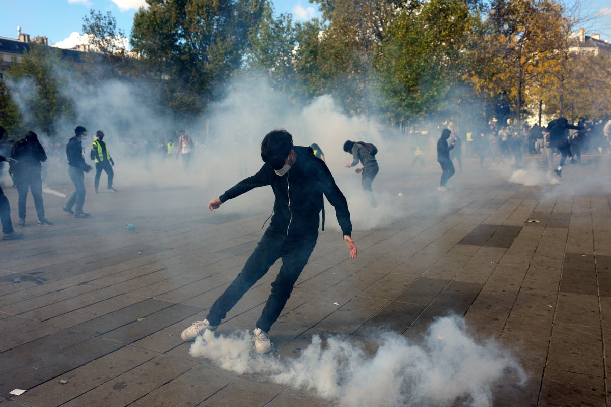 Police use tear gas as protests break out in France