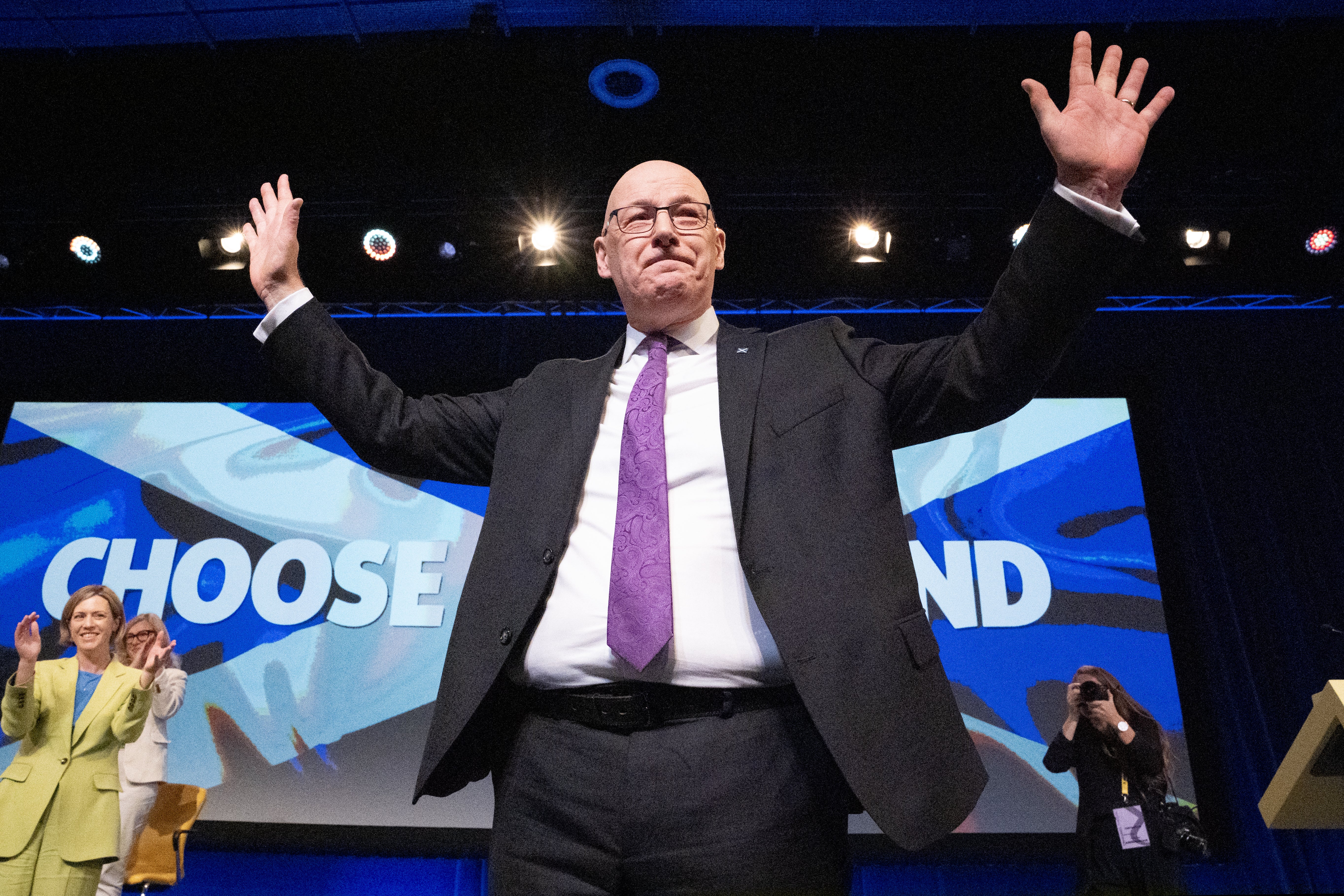 First Minister John Swinney received a standing ovation after delivering his conference speech on Saturday. (Jane Barlow/PA)