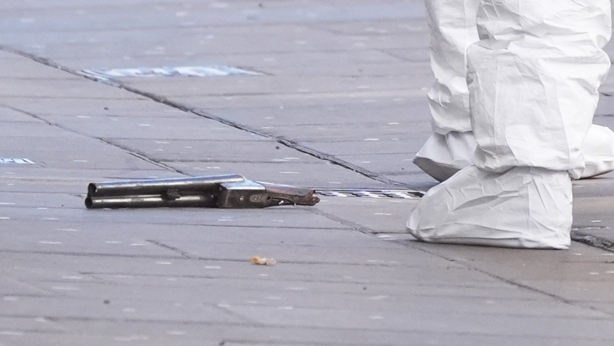 A firearm at the scene on Angel Row in Nottingham, after a police officer has been shot in the city centre