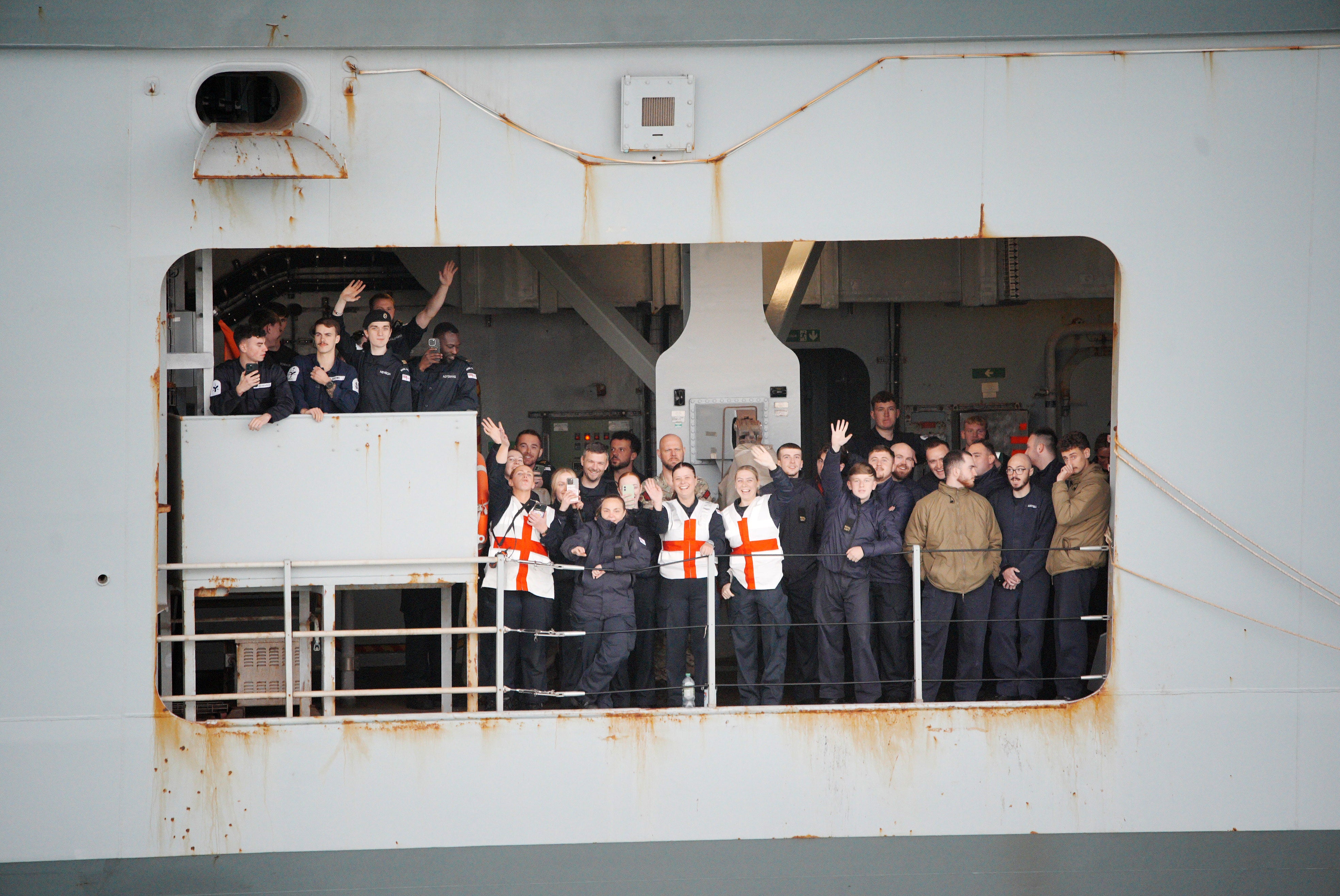 Crew wave, as HMS Prince of Wales leaves Portsmouth Naval Base to lead The UK Carrier Strike Group on deployment to the Arctic and North Atlantic, on Operation Firecrest