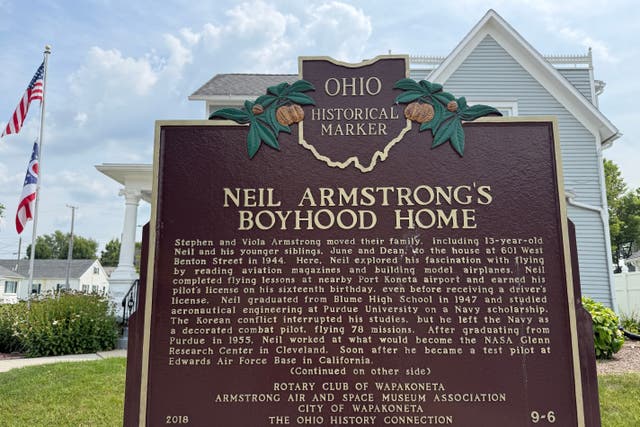 An Ohio historical landmark sign is displayed outside the former home of Neil Armstron