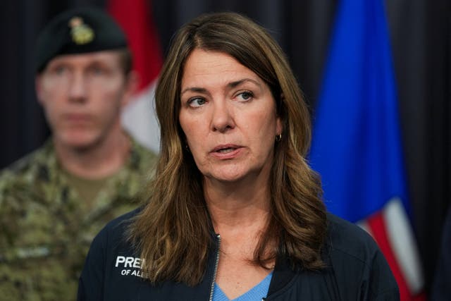 Alberta Premier Danielle Smith speaks during a press conference following a serious incident that resulted in a fire that caused deaths and injuries at Canadian Forces Base