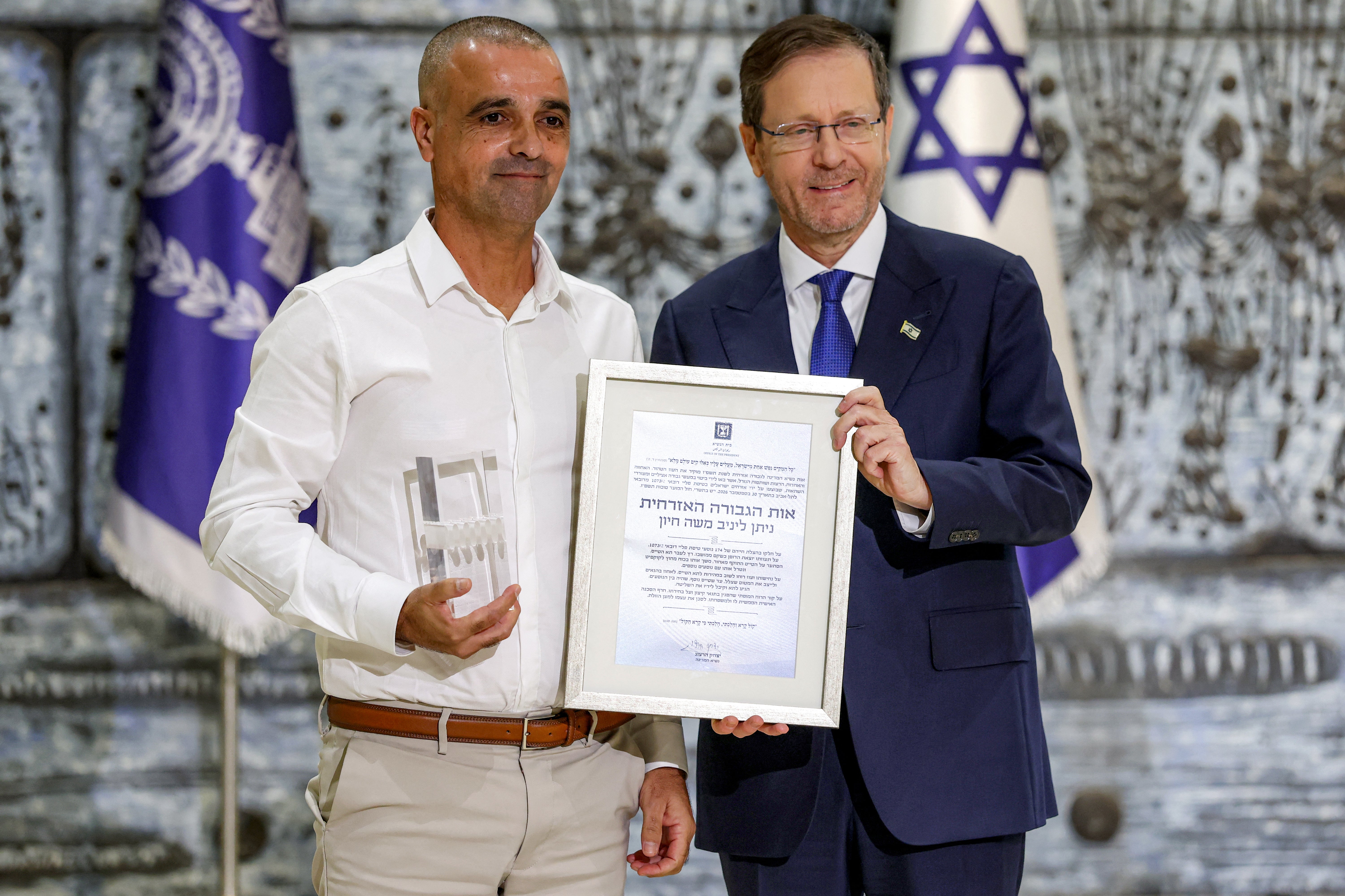 Israeli president Isaac Herzog awards Yaniv Hayoun