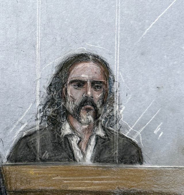 The comedian, 51, in the dock at Southwark Crown Court