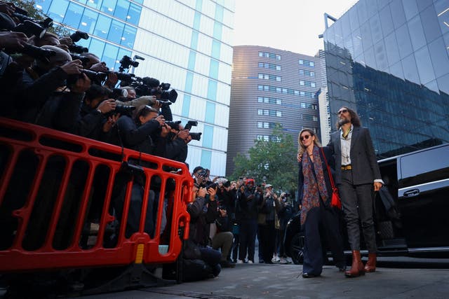 Russell Brand arriving at Southwark Crown Court with his wife, Laura Gallacher