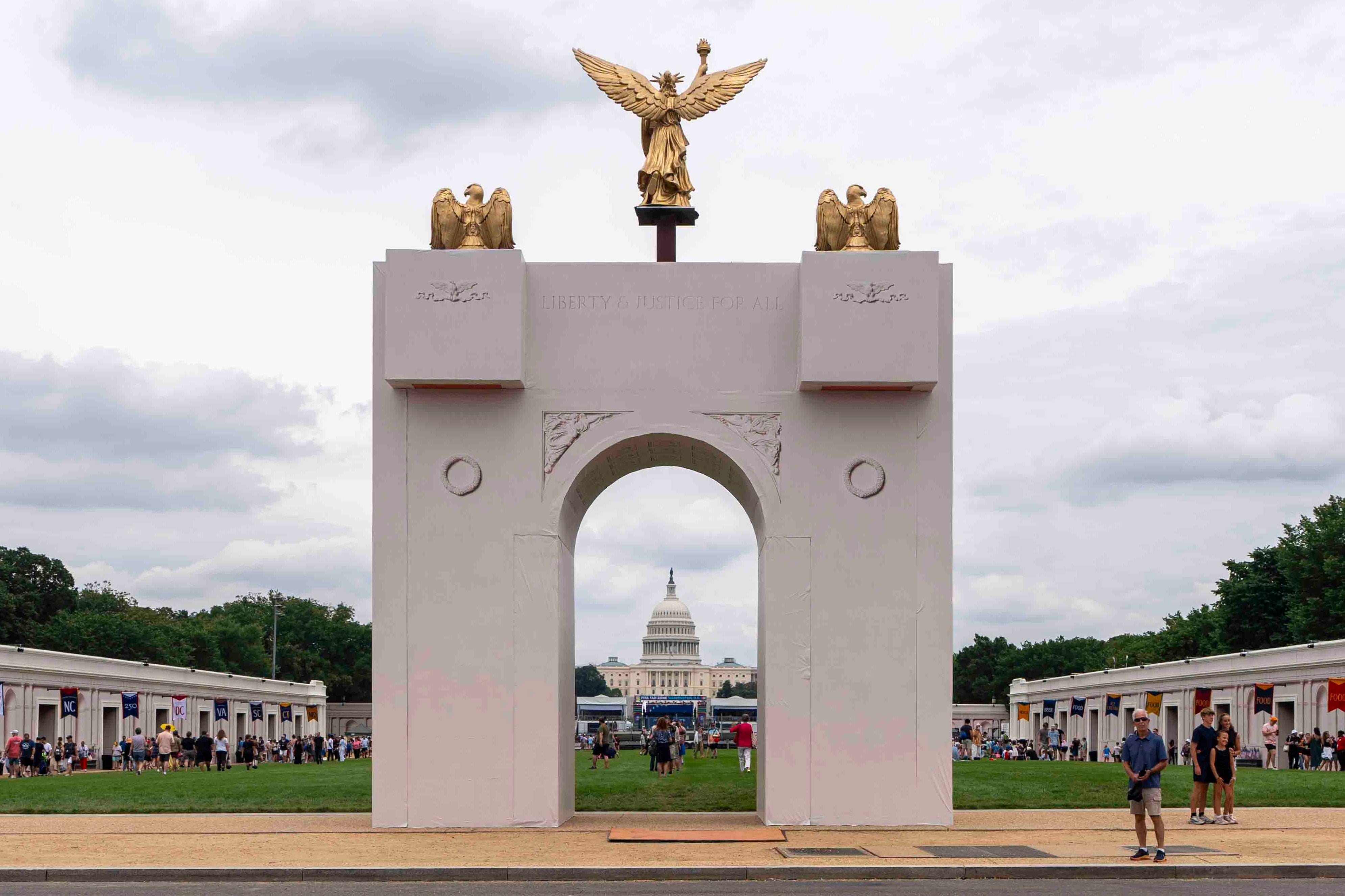 A mockup of President Donald Trump's proposed triumphal arch stands at the Great American State Fair on the National Mall