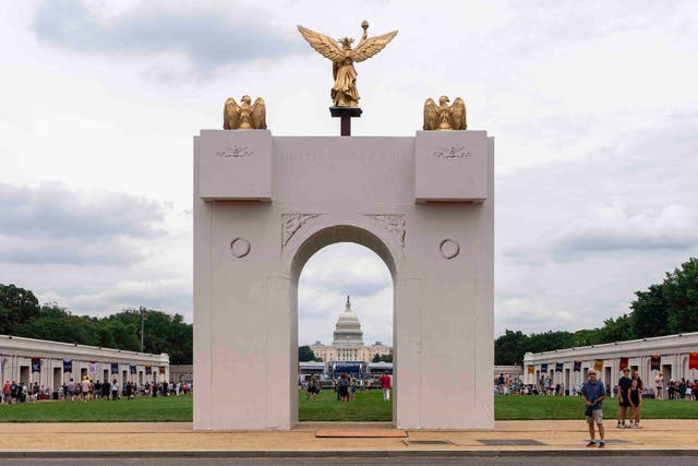 A mockup of President Donald Trump's proposed triumphal arch stands at the Great American State Fair on the National Mall