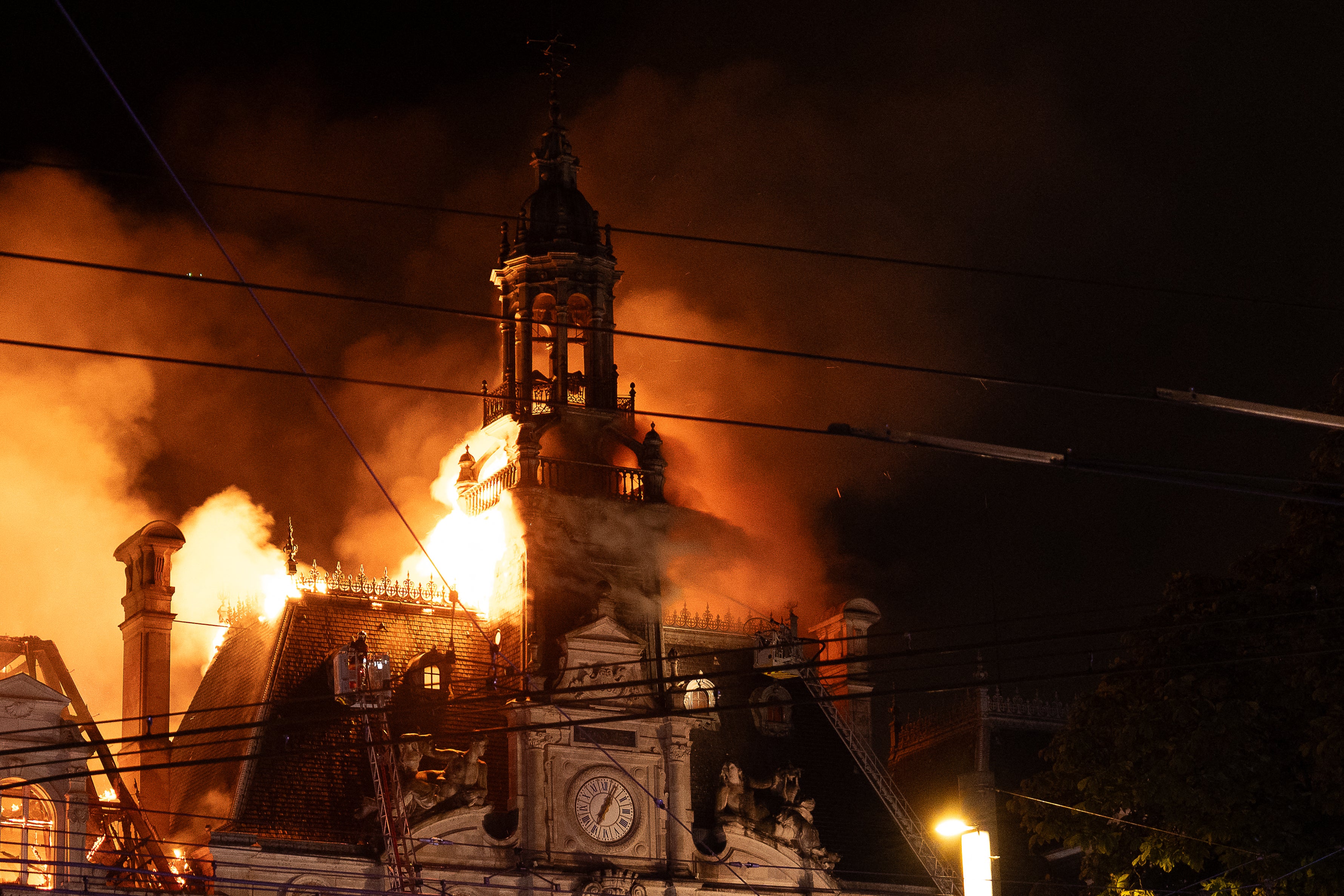 Man arrested after historic town hall in France burned down during night of riots and looting