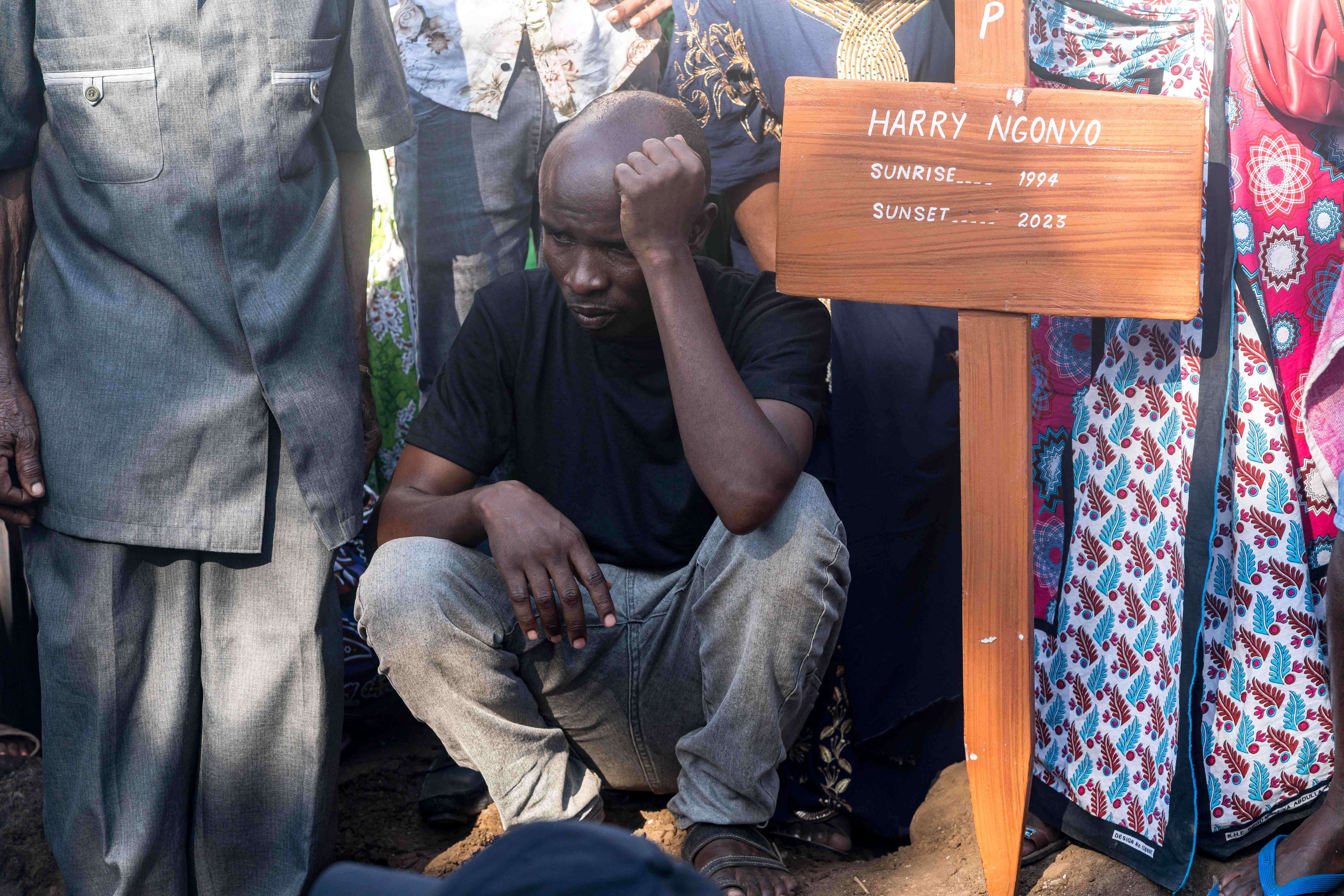William Ngonyo attends the burial of his 29-year-old brother Harry Ngonyo and other victims of what is known as the Shakahola massacre, in Malindi, on April 5, 2024