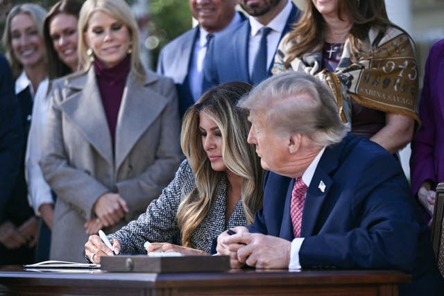 Donald and Melania Trump signed the executive order together as he mused: 'I don't know if her signature means anything'