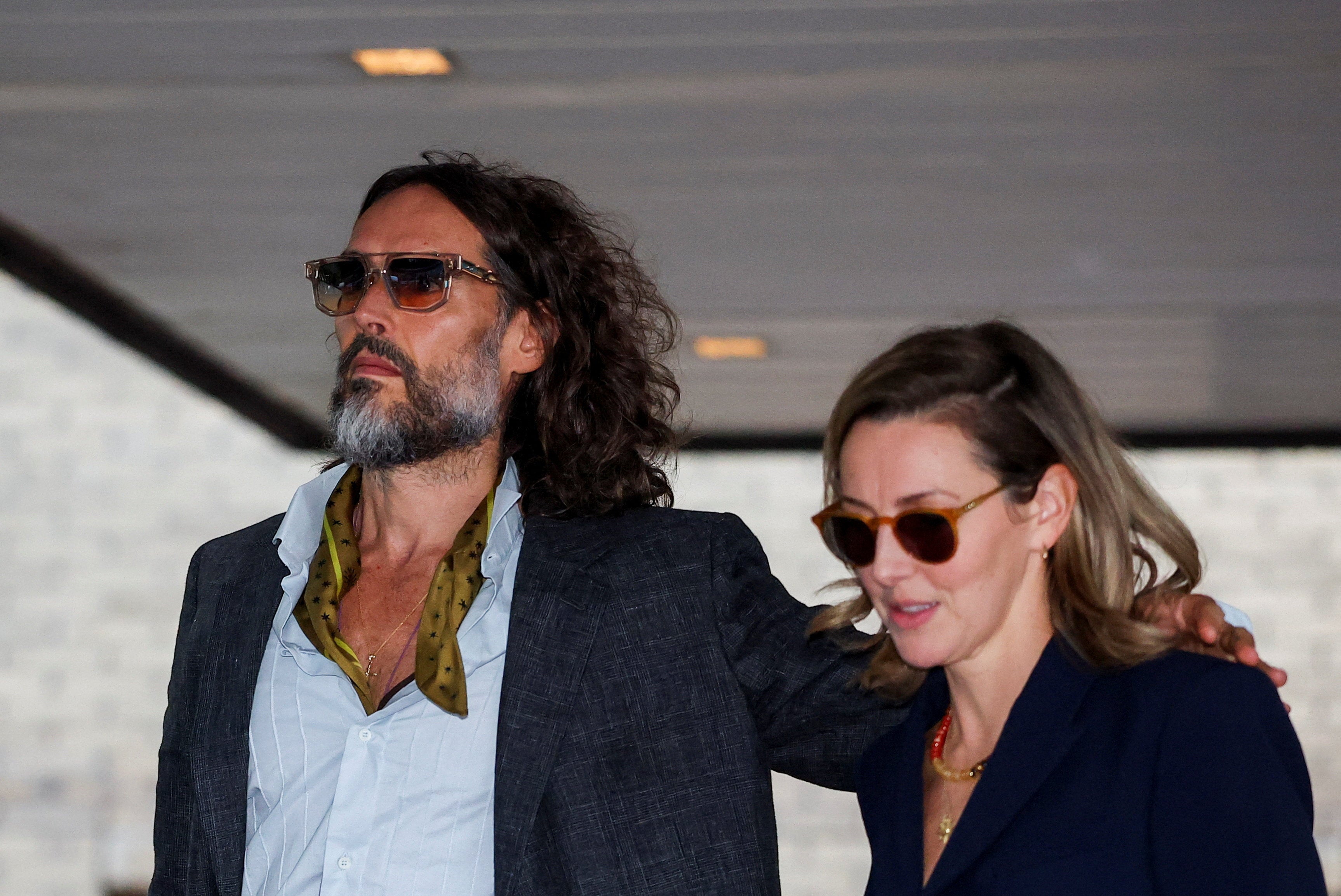 Russell Brand at Southwark Crown Court with his wife, Laura Gallacher