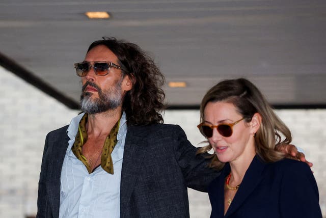 Russell Brand at Southwark Crown Court with his wife, Laura Gallacher