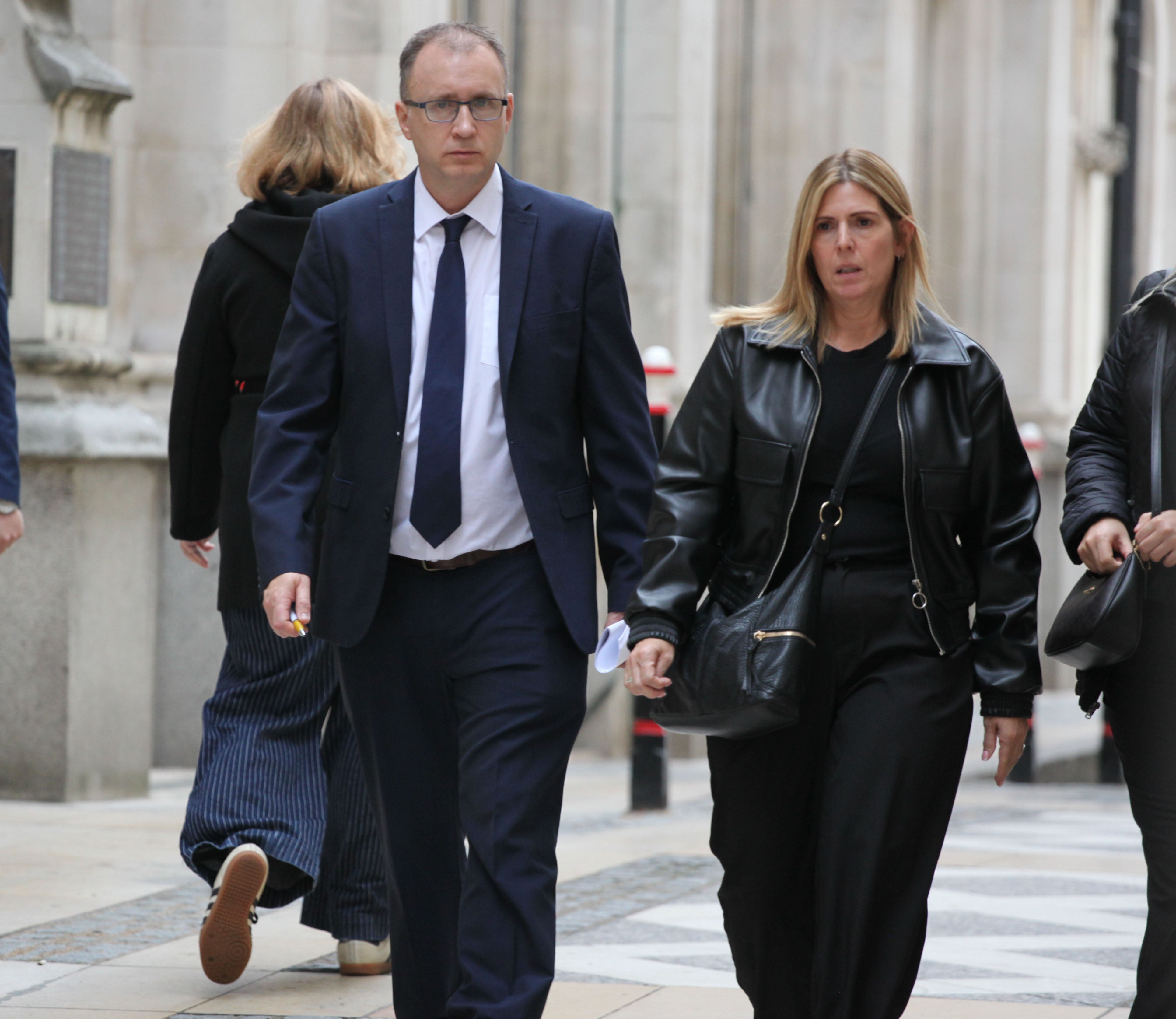 Justin and Karen Salmon outside Mayors and City County Court after hearing in dispute over 'man cave'