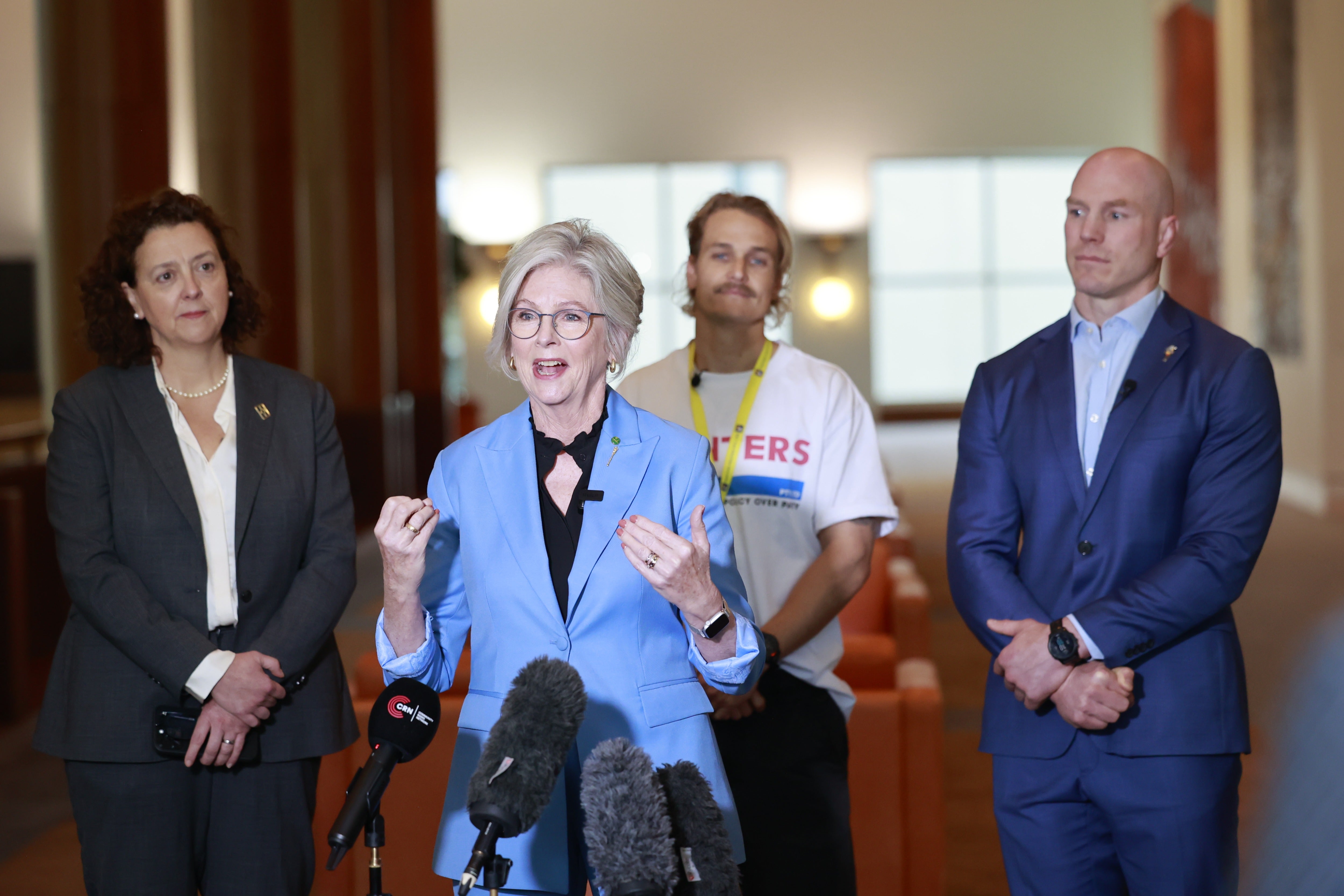Helen Haines (2nd-L) speaks to the media in November last year