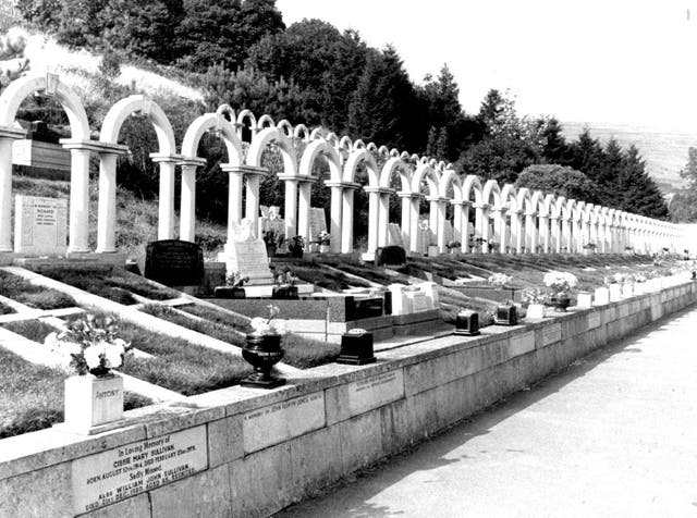 Rows of headstones in Aberfan cemetery mark the final resting places of the dead in the disaster