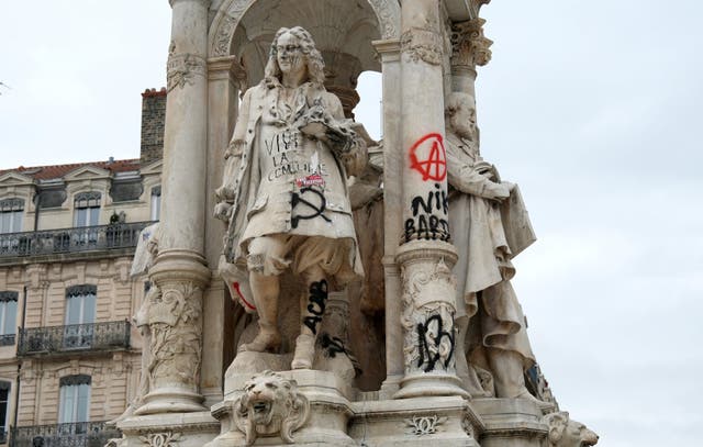 View of the Fontaine des Jacobins which was vandalised during clashes that erupted during a national day of demonstrations against the cost of living and rising fuel prices, in Lyon