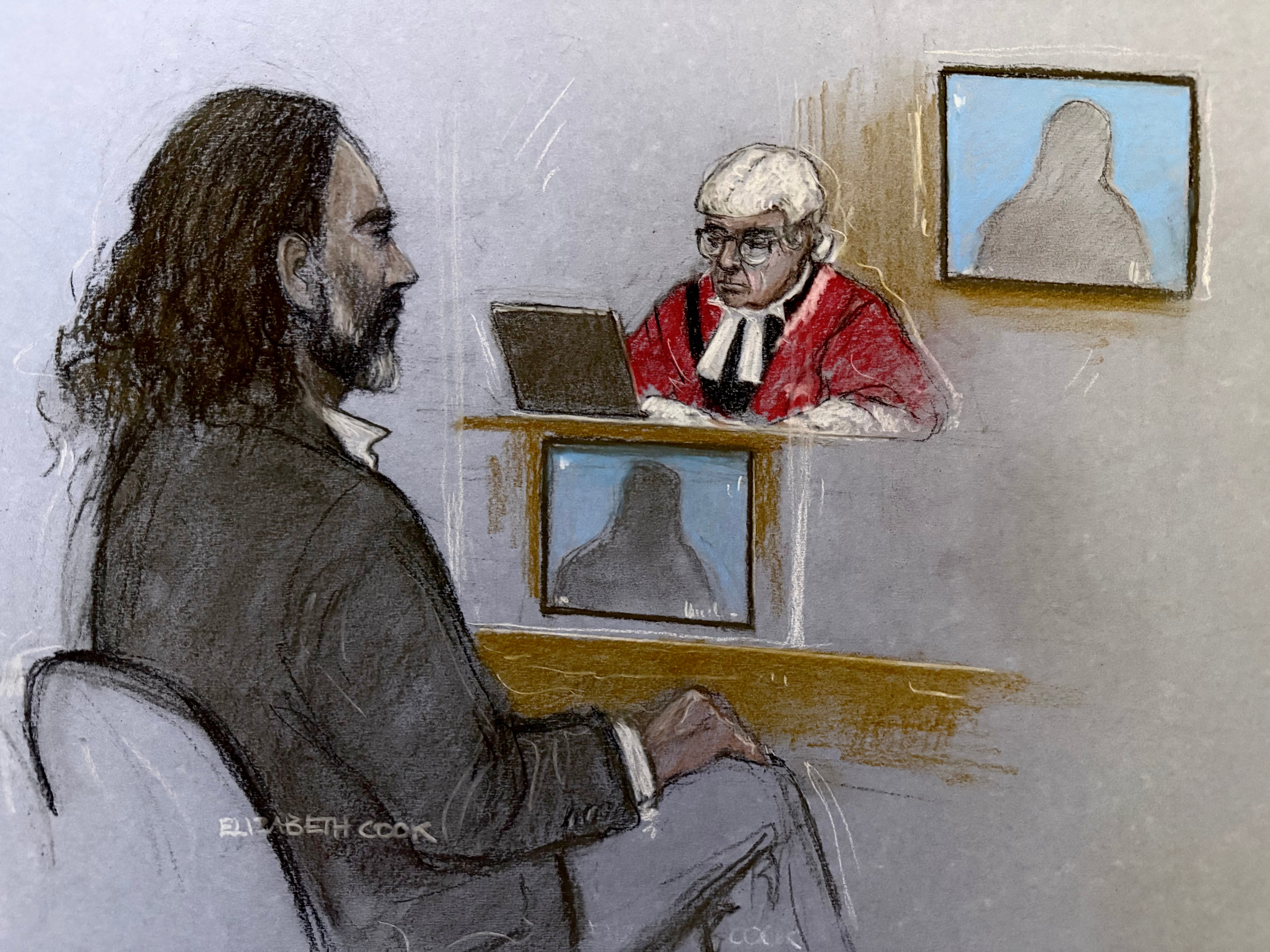 Russell Brand appearing in the dock at Southwark Crown Court