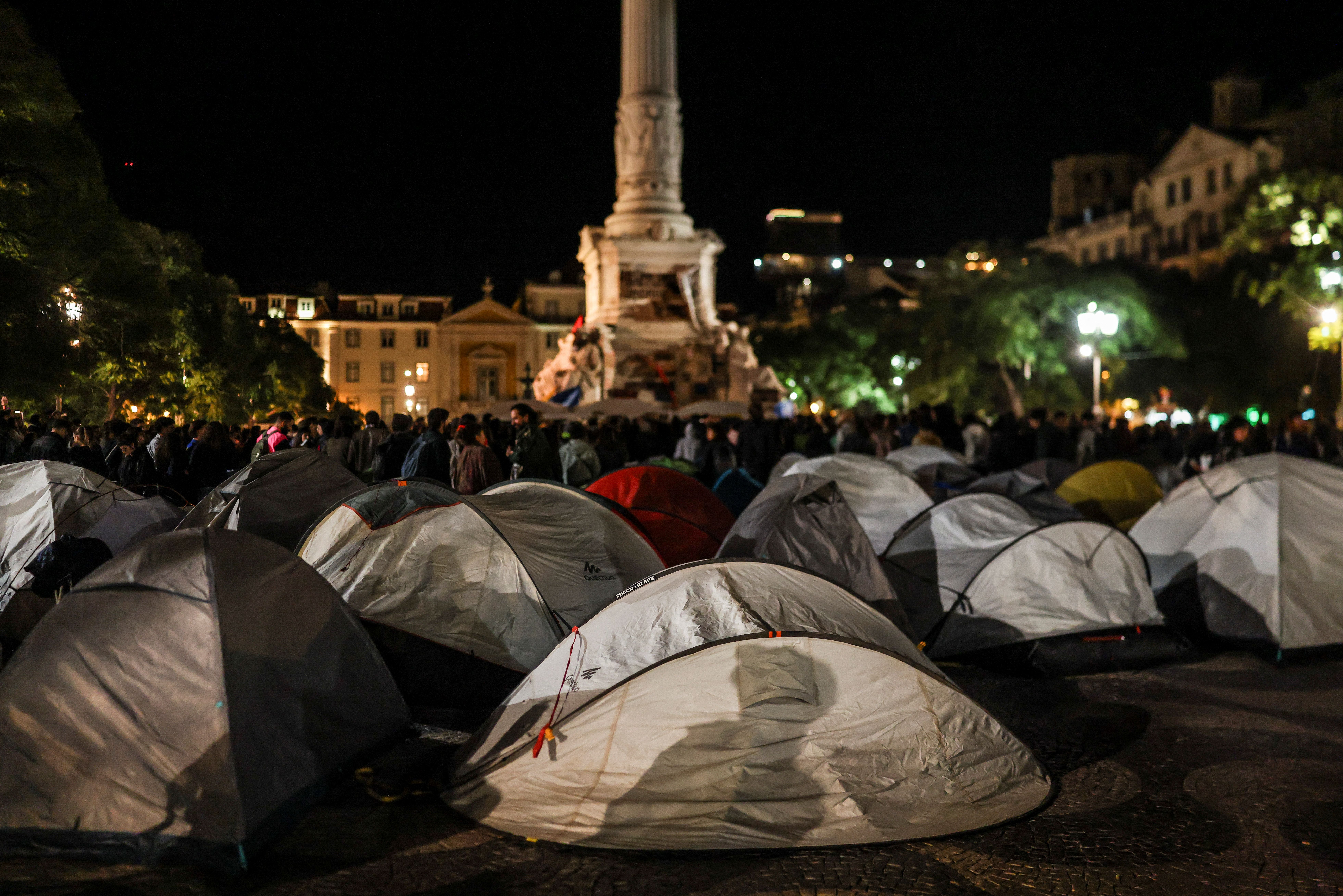 Dozens of tents are pictured during a encampment set up in protest against housing shortage, soaring rents and low wages, at Rossio square in central Lisbon.