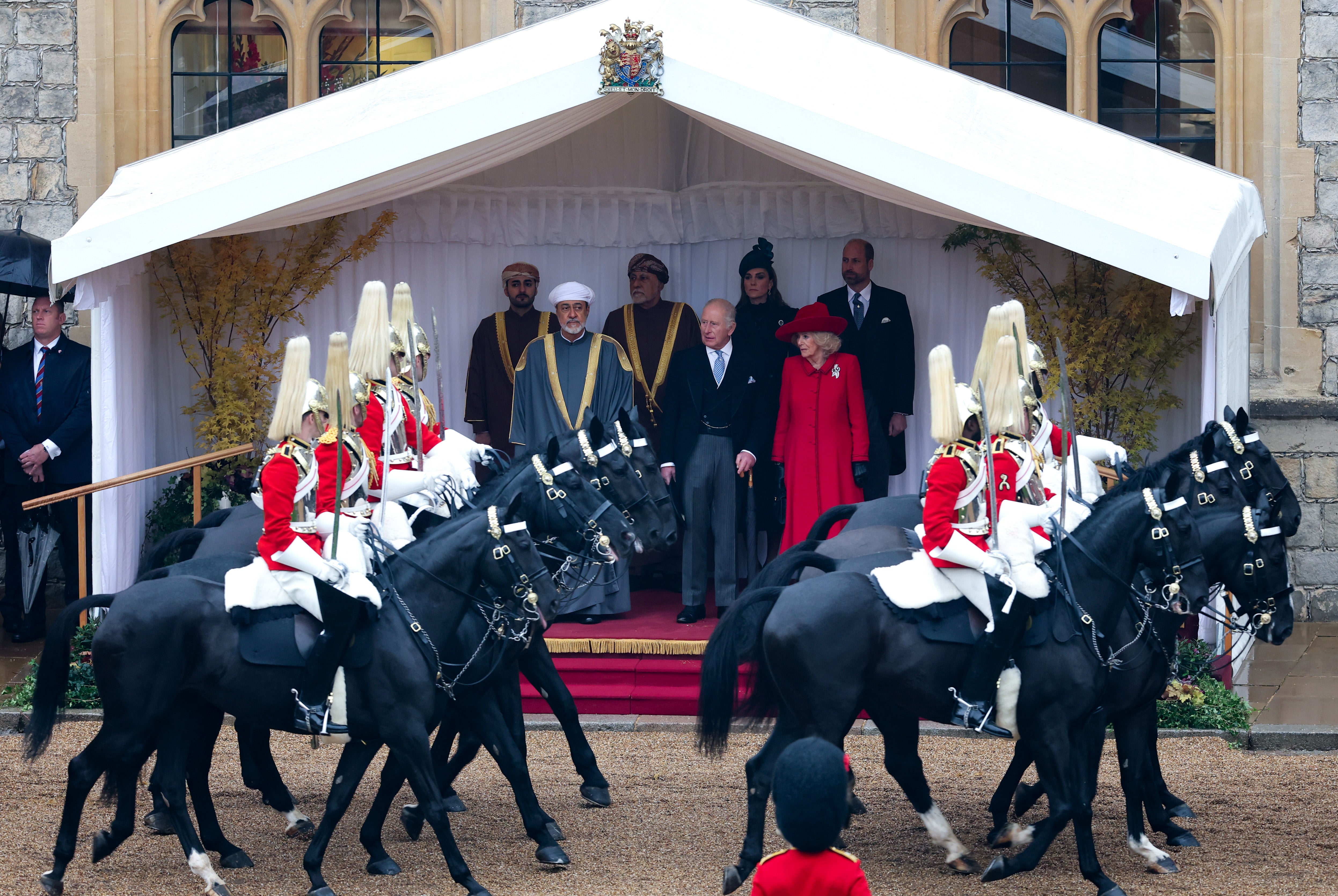From left: H.H. Sayyid Theyazin bin Haitham Al Said, Deputy Prime Minister for Economic Affairs, The Sultan of Oman, Haitham bin Tariq Al Said, H.H. Sayyid Shihab bin Tariq Al Said, Deputy Prime Minister for Defence Affairs, King Charles III, Catherine, Princess of Wales, Queen Camilla and Prince William, Prince of Wales in the Quadrangle of Windsor Castle during the ceremonial welcome
