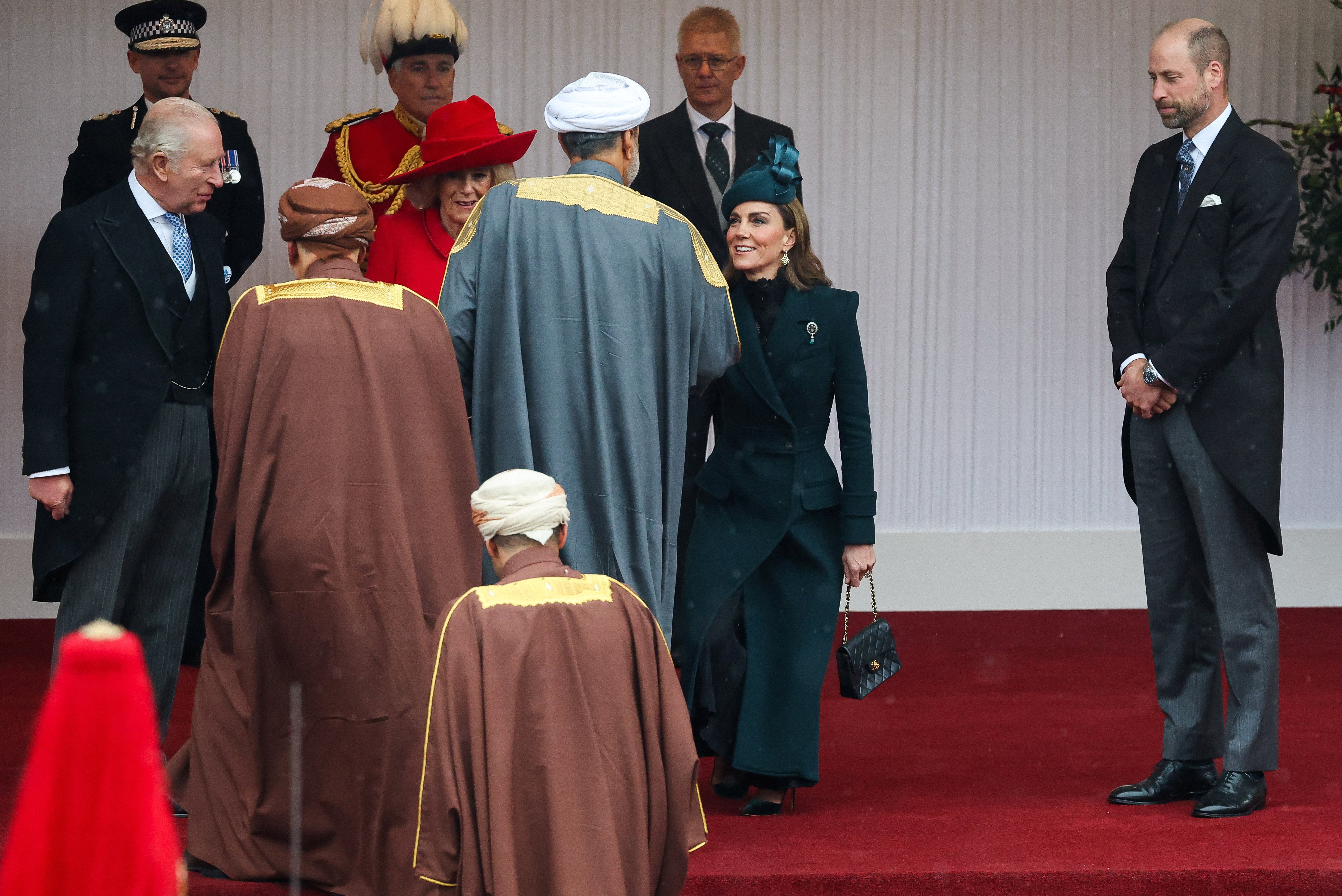 Kate curtseys while greeting the Sultan