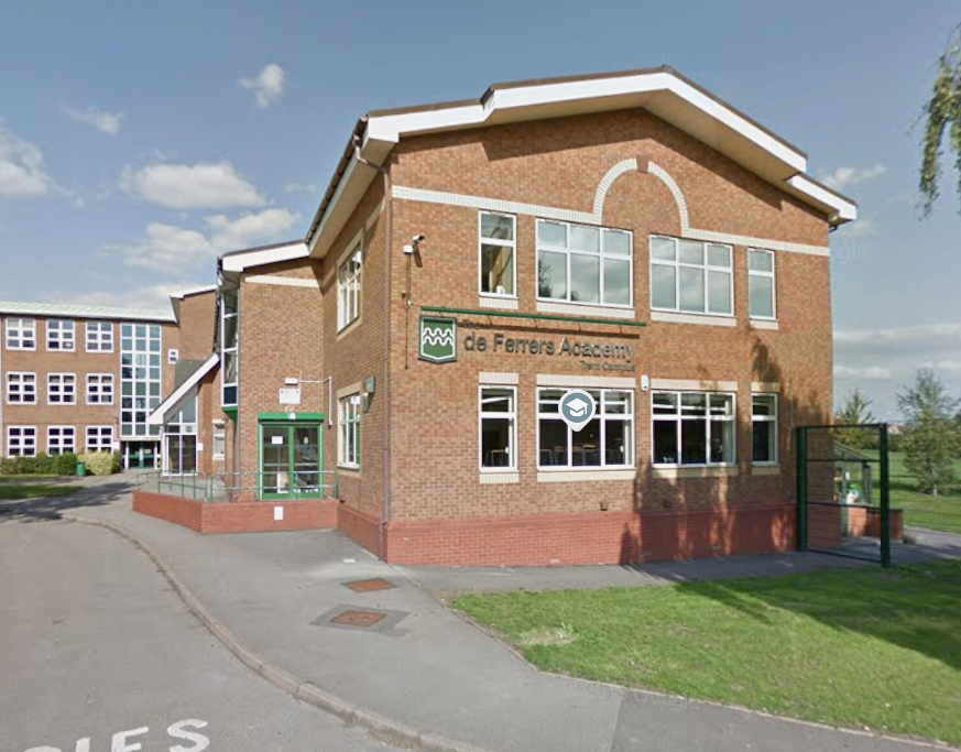 Teacher banned from classroom after shoving boy against wall and swearing at him