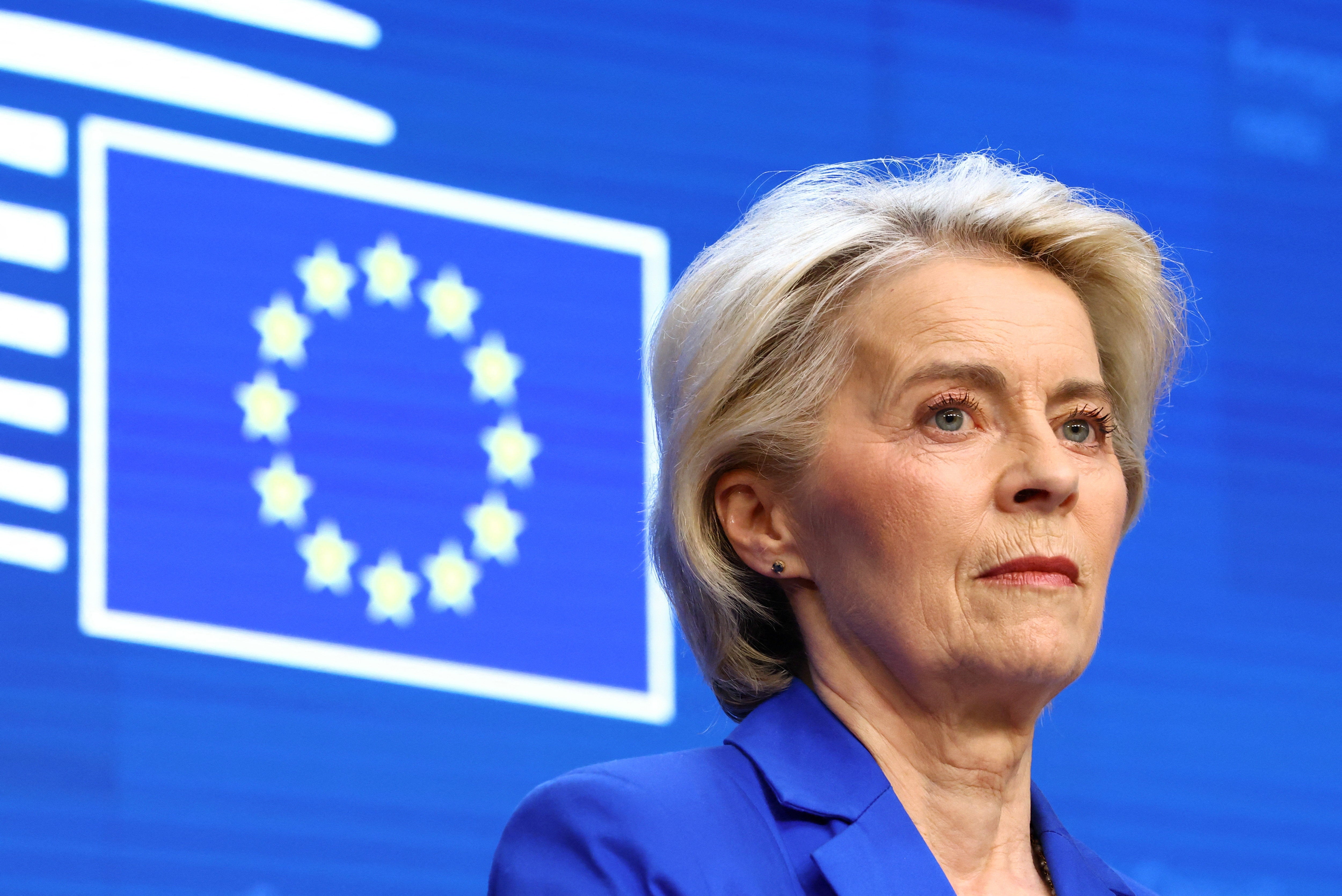 Ursula von der Leyen looks on durin