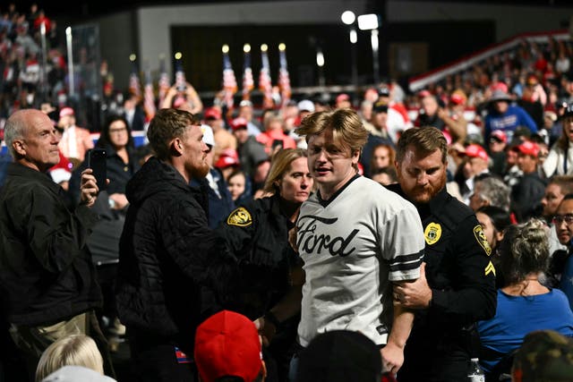 'They get paid by the radical left lunatics that you watch taking place in France,' Trump said Tuesday night. 'I would say this is a slightly lesser event,' he then admitted.