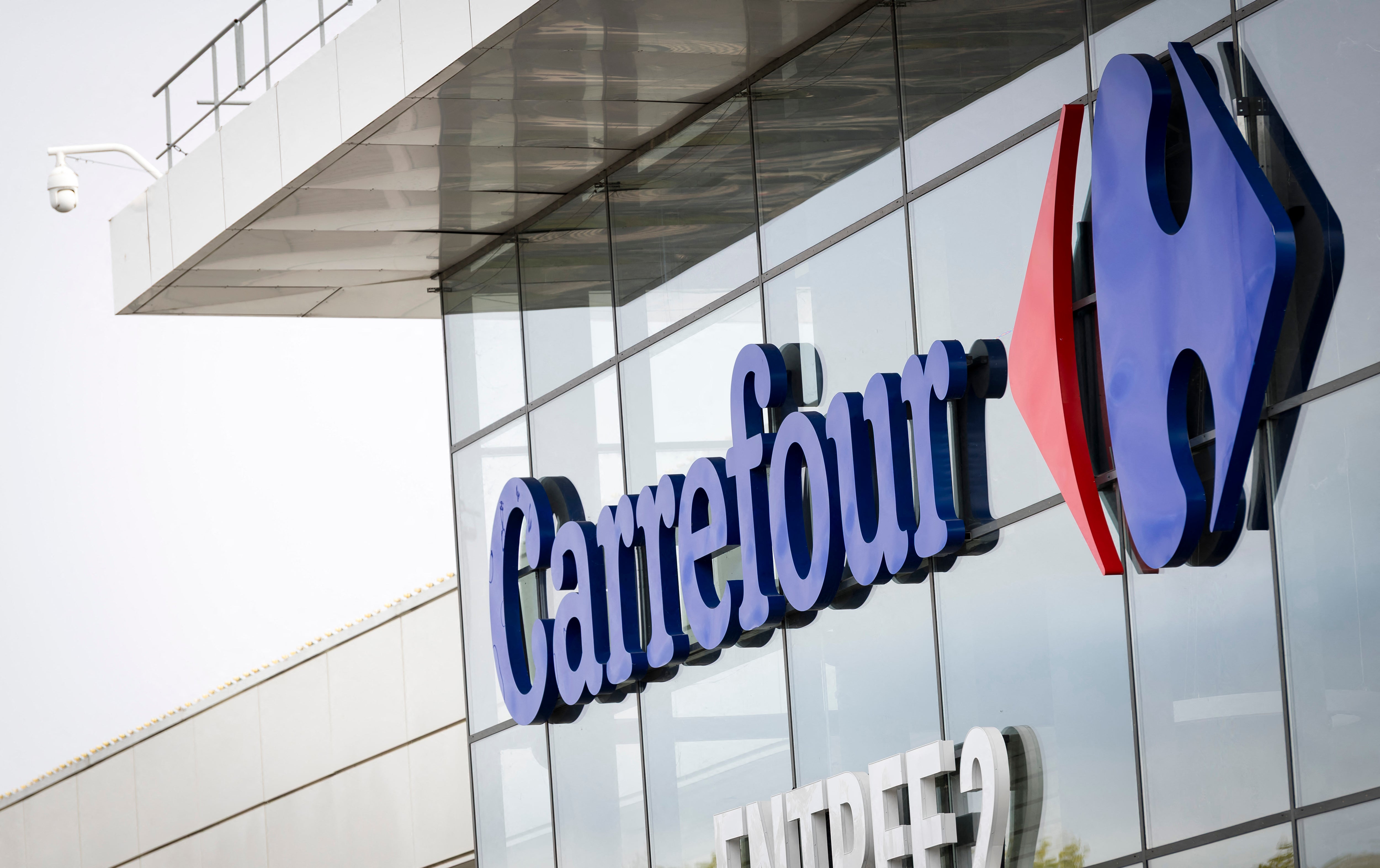 French supermarket chain suffers €1.6 billion hit after riots and looting